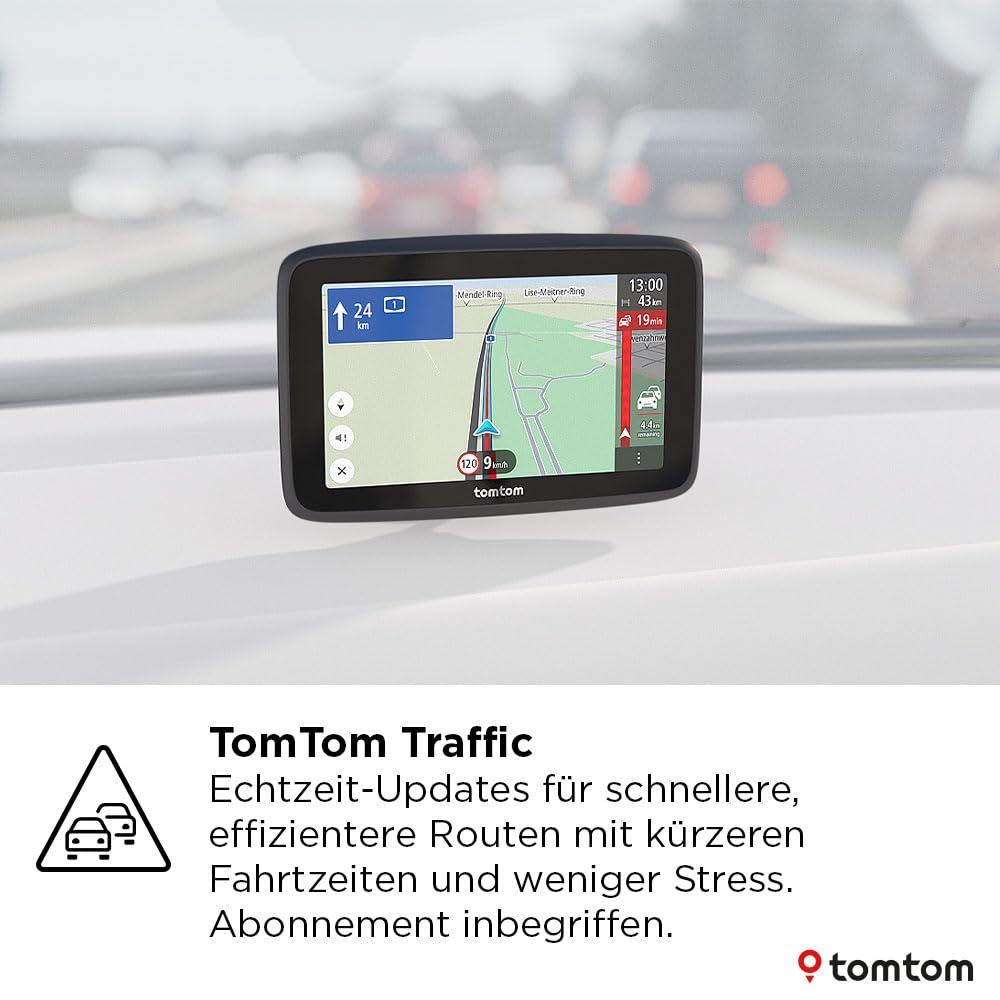Un navigatore GPS TomTom sul cruscotto di un'auto che mostra mappa e dati sul traffico.