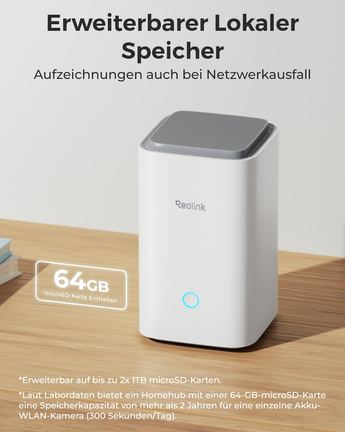 Dispositivo Reolink home hub bianco con parte superiore grigia su un tavolo di legno.
