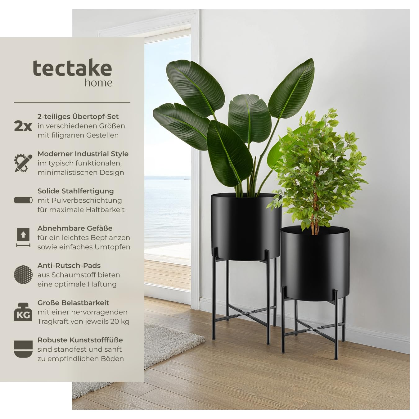 Deux porte-plantes en métal noir avec de grandes plantes vertes dans une pièce lumineuse.