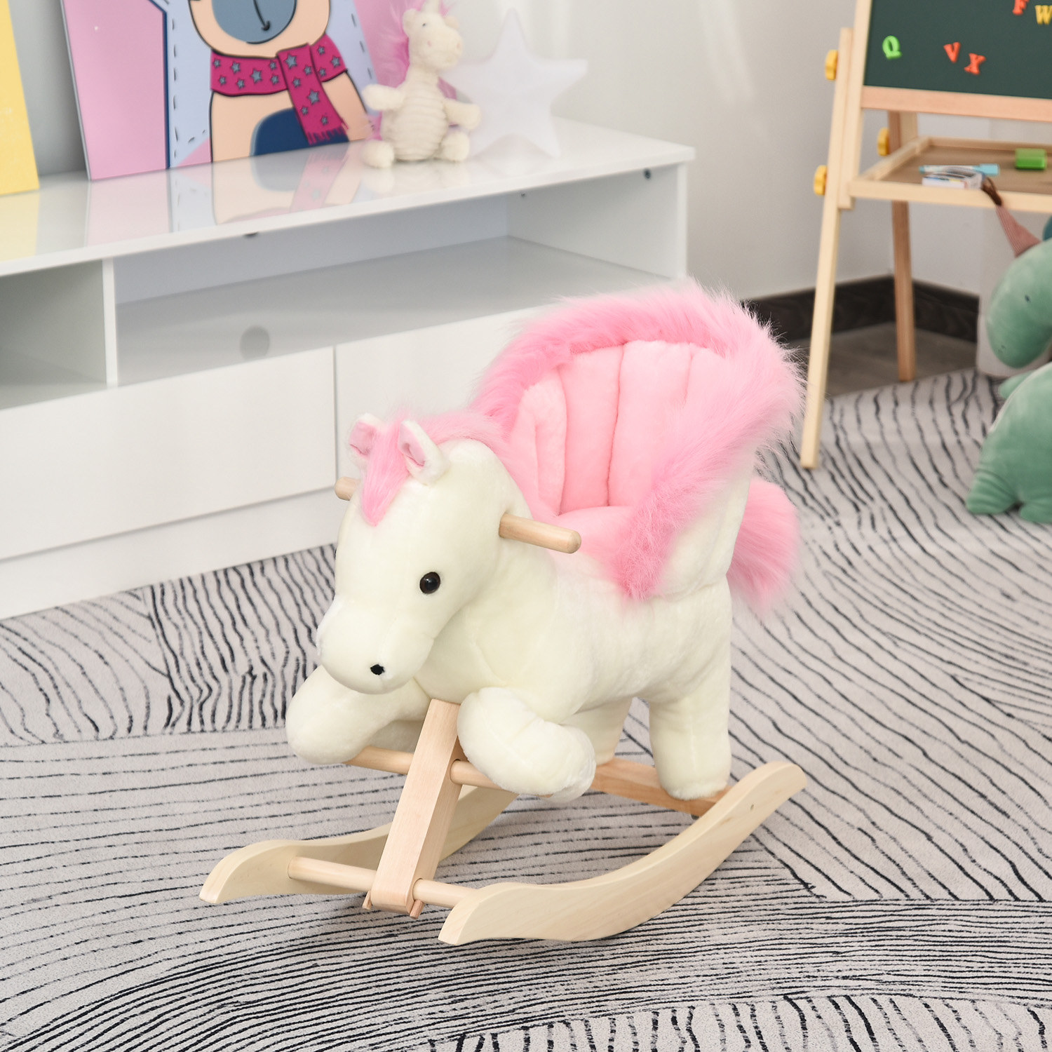 Cavallo a dondolo di peluche con criniera e coda rosa su base di legno in una cameretta.