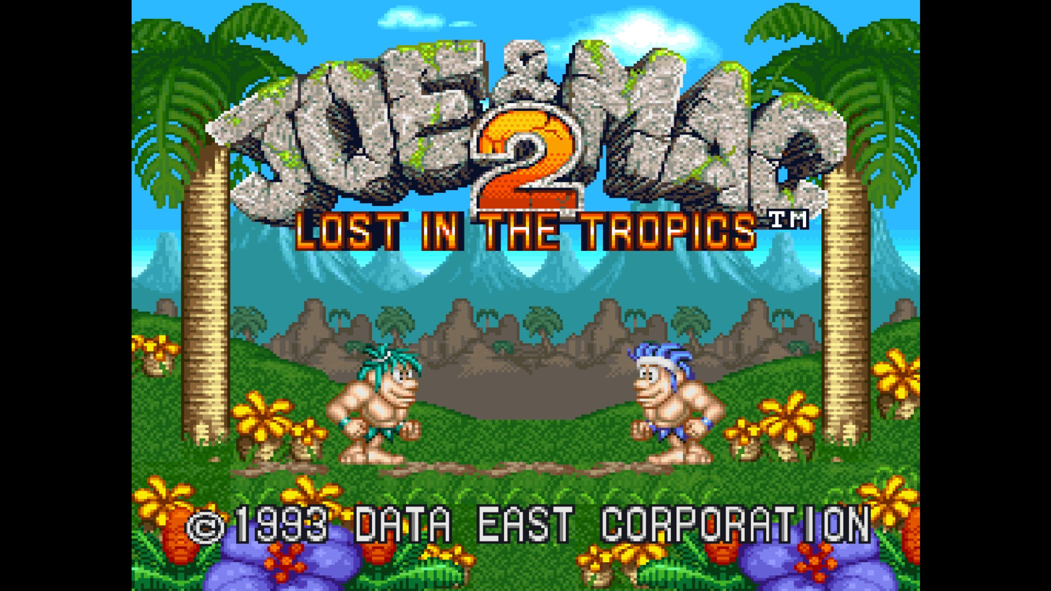 Schermata del titolo di Joe and Mac 2 Lost in the Tropics con due cavernicoli in una giungla.