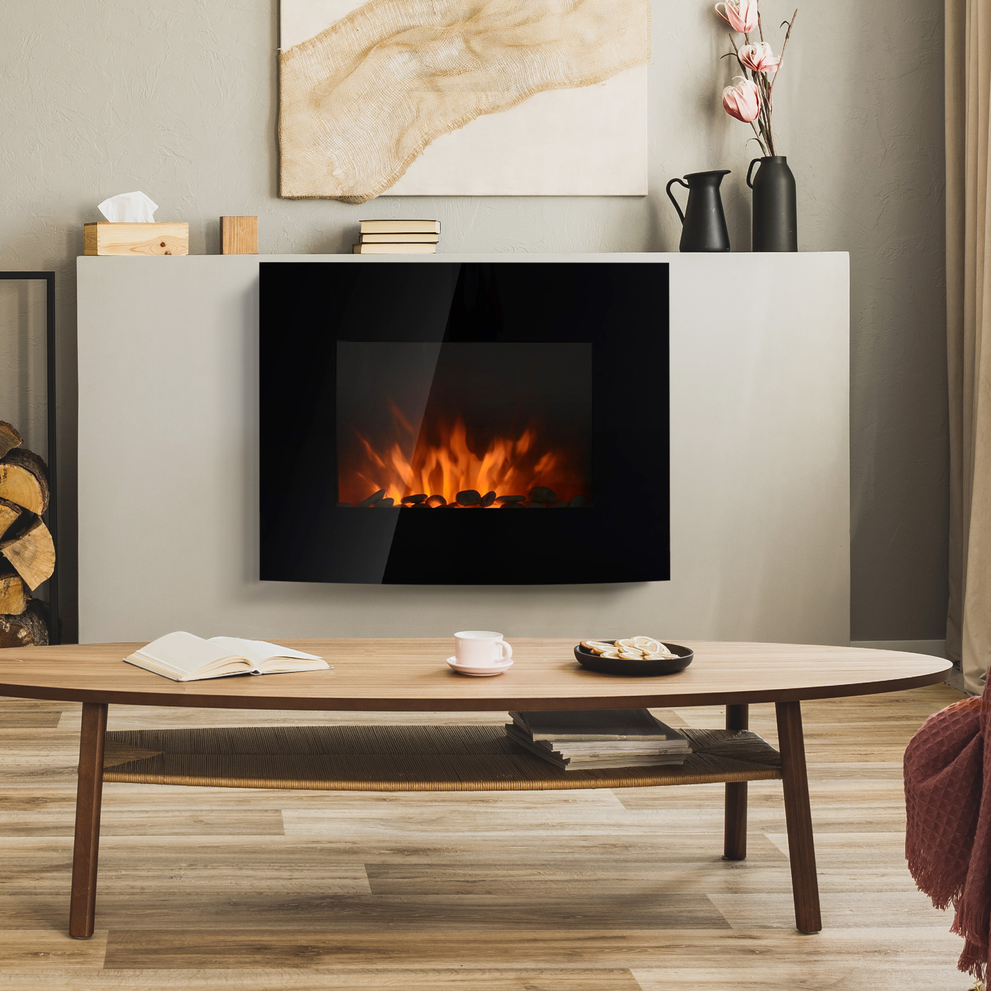 Salón con chimenea eléctrica, mesa de madera con libro y taza, y obra de arte en la pared gris.