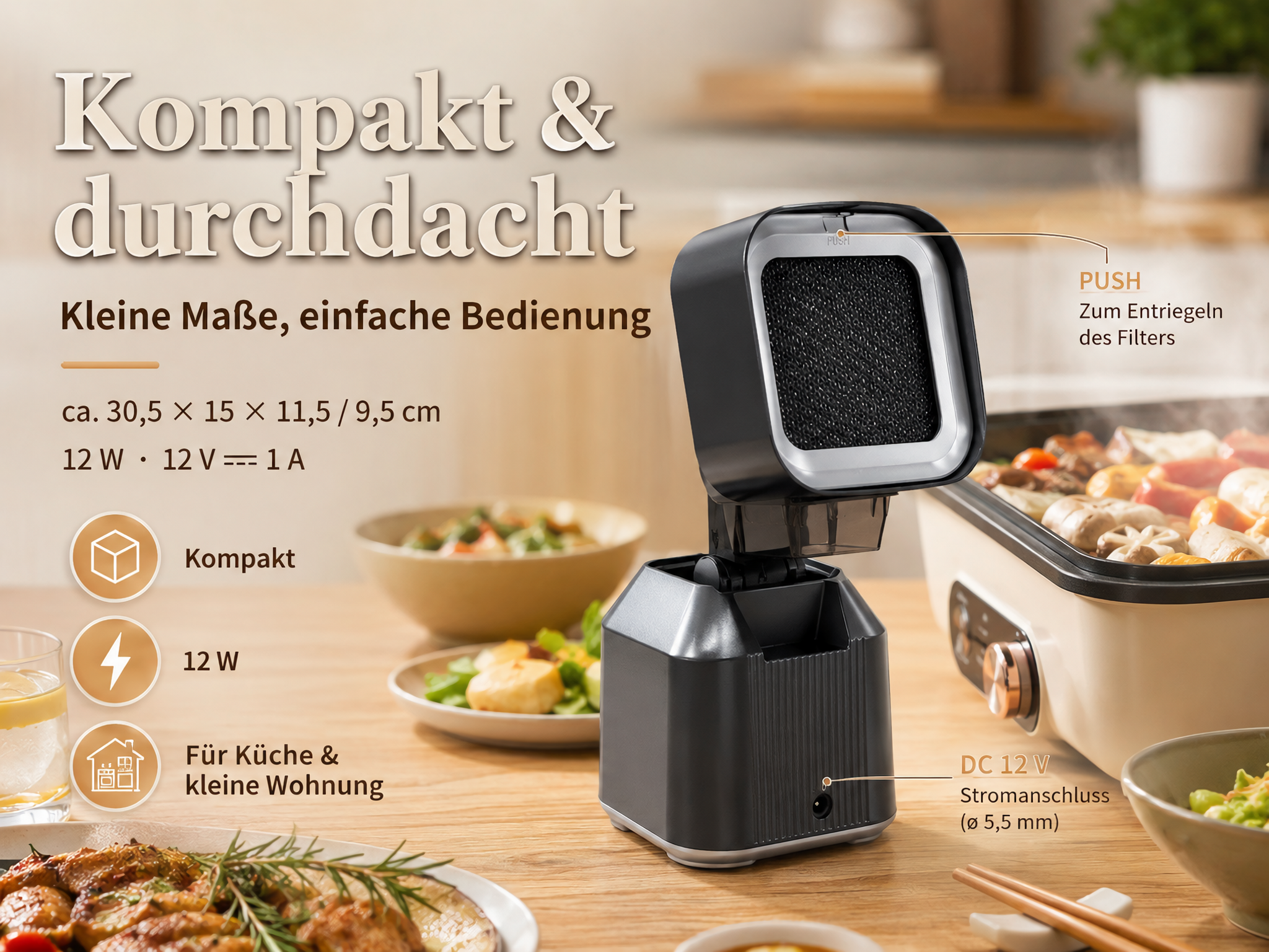 Ein schwarzer, kompakter Küchen-Dunstabzug auf einem Holztisch mit Essen und Infotexten.