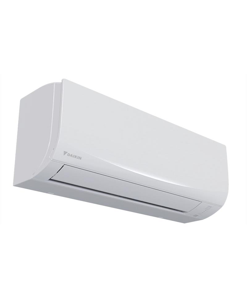 Beyaz duvara monte edilmiş beyaz bir Daikin klima ünitesi.