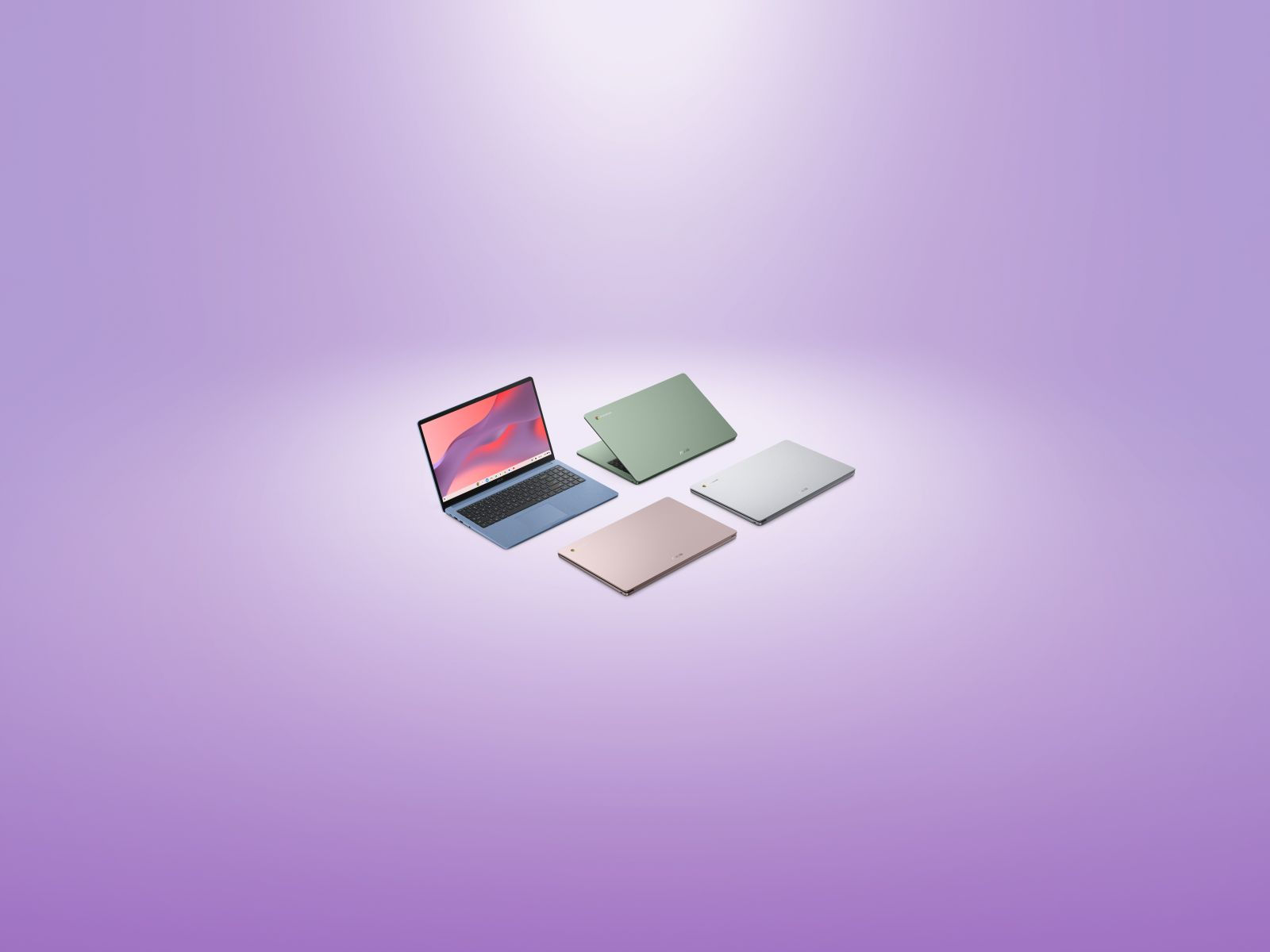 Vier bunte Laptops auf hellila Hintergrund, einer ist aufgeklappt.