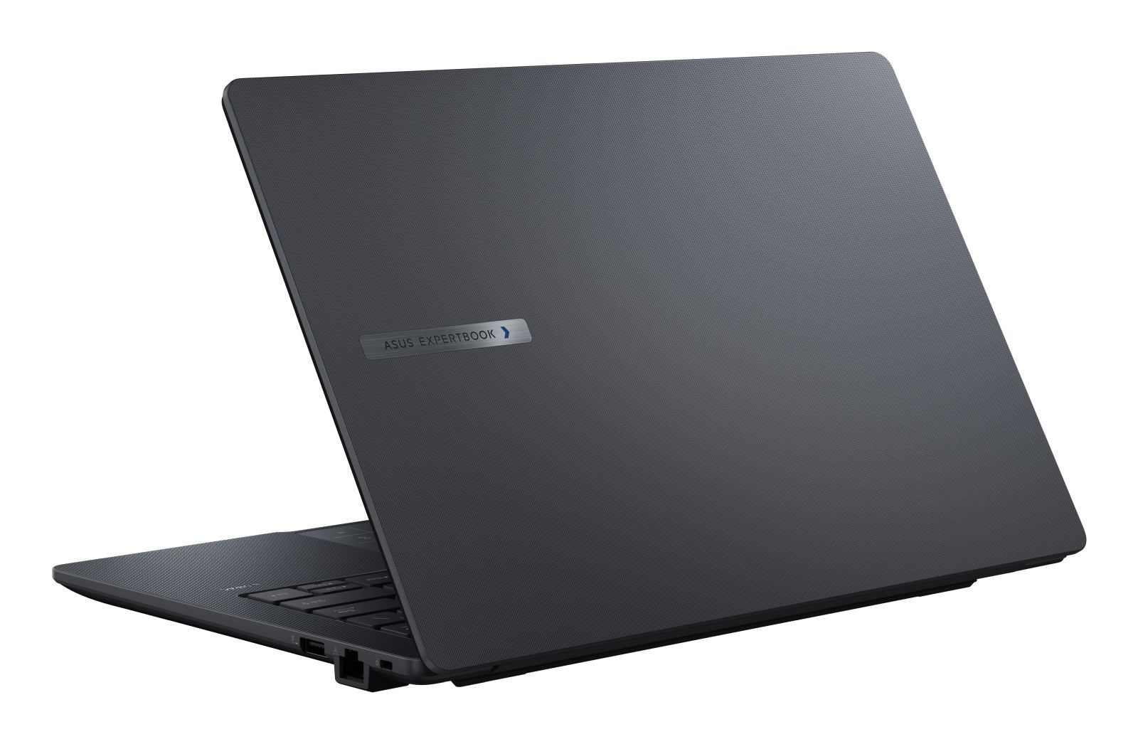 Ein grauer Asus ExpertBook Laptop steht auf einer weißen Oberfläche mit geschlossenem Display und sichtbarem Logo.