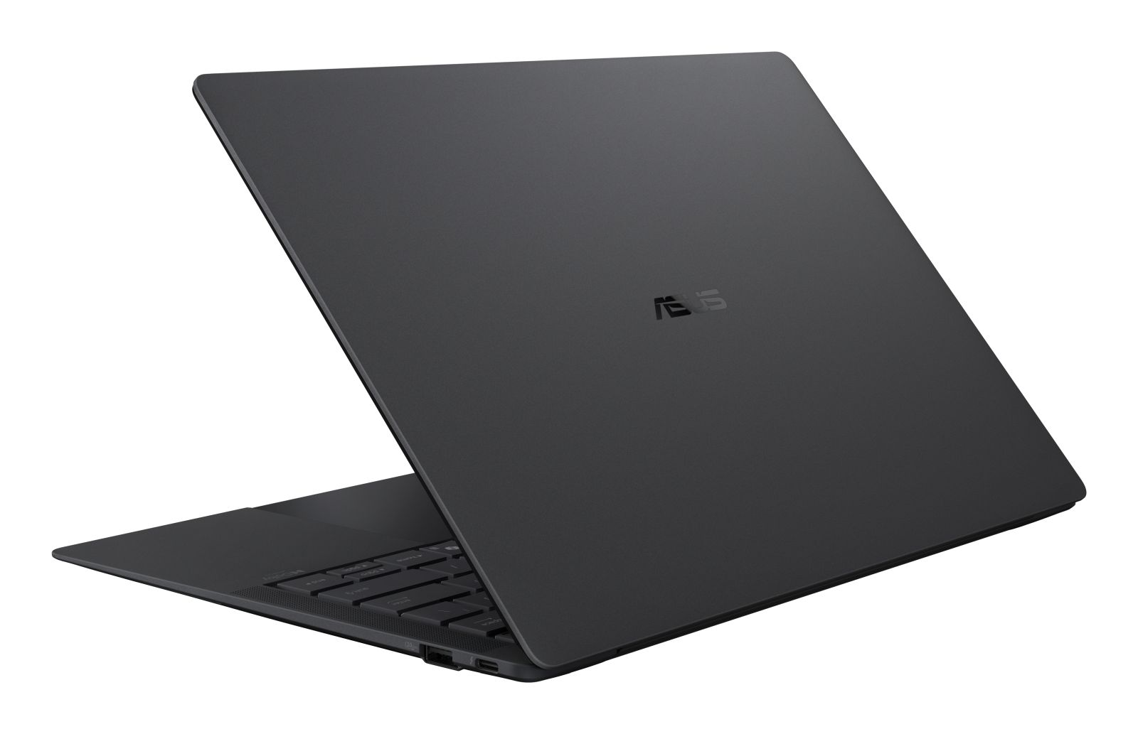 Ein geschlossener schwarzer Asus-Laptop auf weißem Hintergrund.