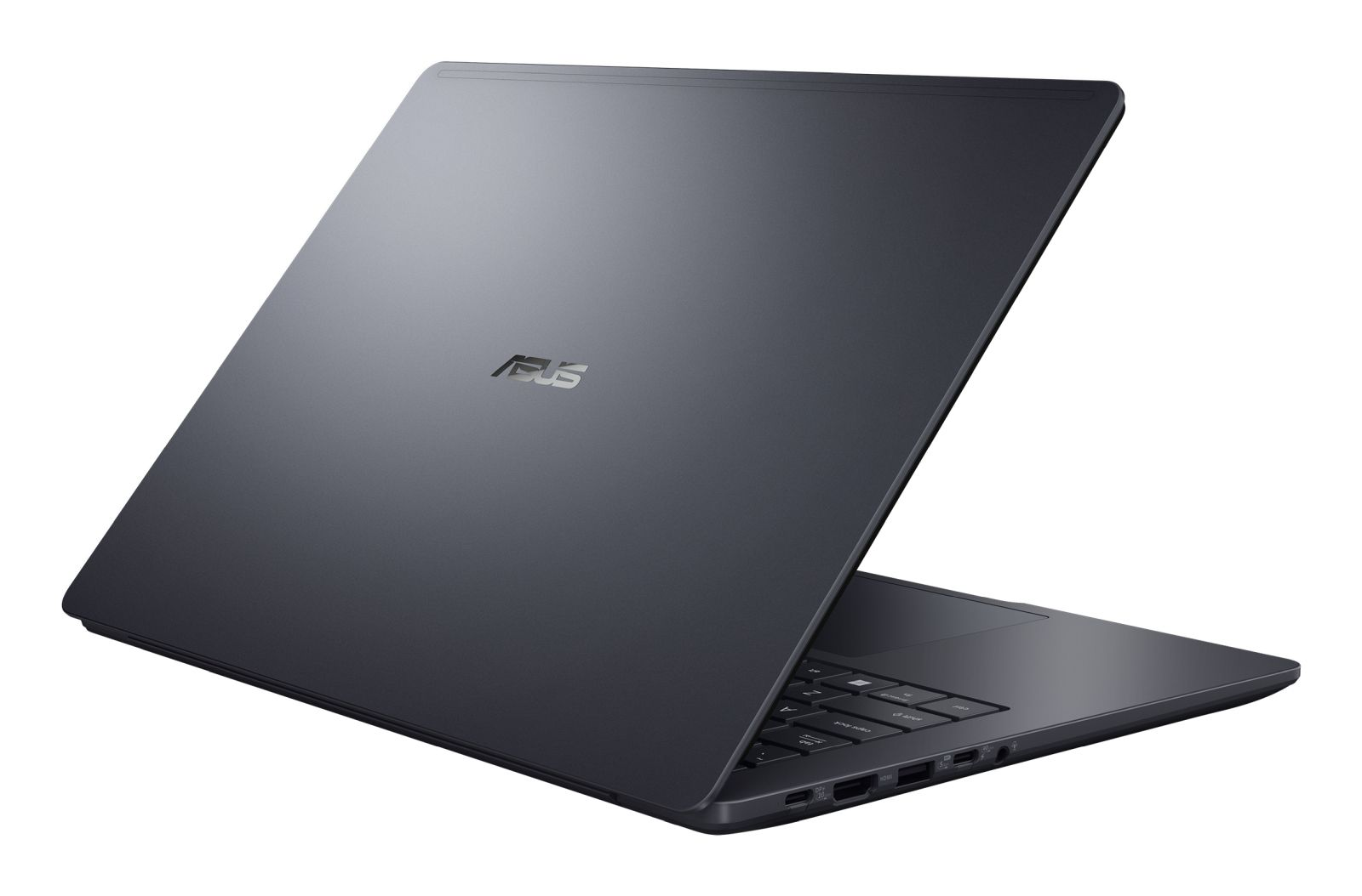Ein geschlossener, dunkelgrauer Asus-Laptop auf einer weißen Oberfläche mit sichtbaren Anschlüssen.