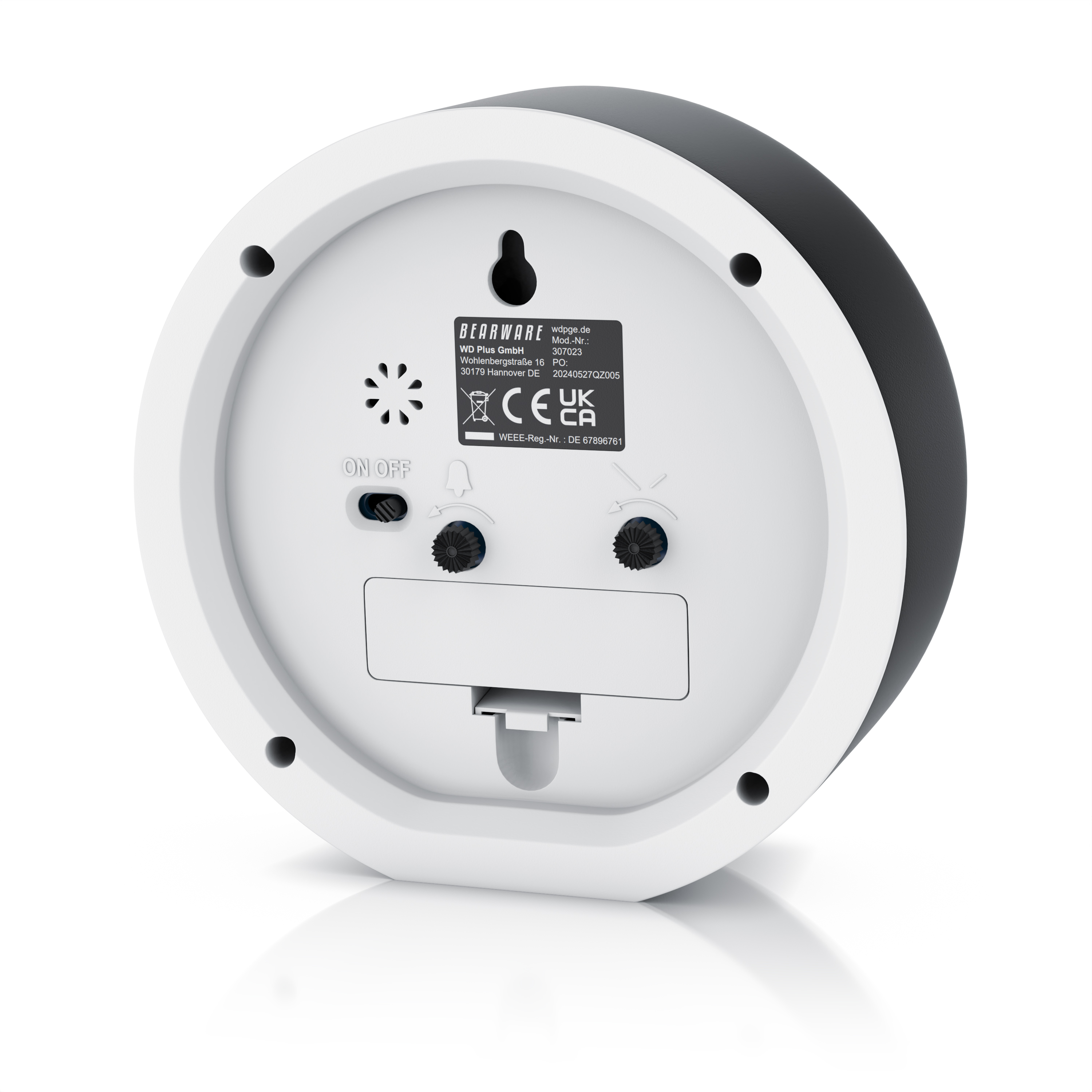 Rückseite einer schwarz-weißen Tischuhr mit Batteriefach, On/Off-Schalter und Einstellrädern.