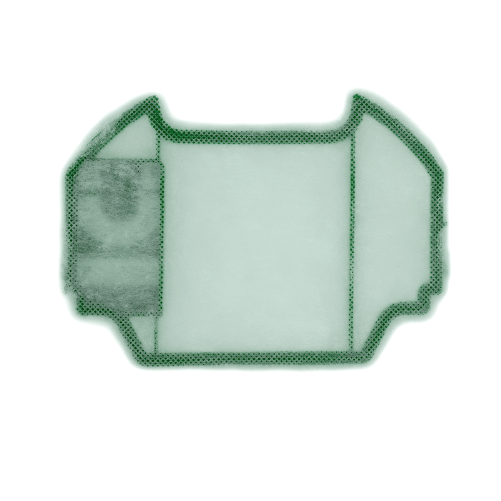 Un'unità di filtro rettangolare tinta di verde con motivi a pois su sfondo bianco.