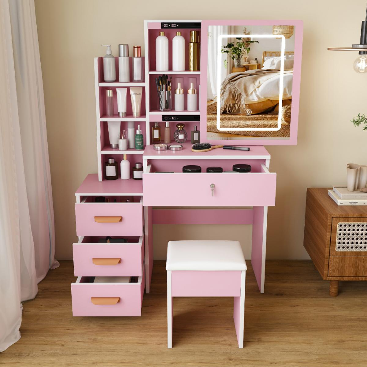 Rosa und weißer Schminktisch mit beleuchtetem Spiegel, offenen Regalen, Schubladen und passendem Hocker.