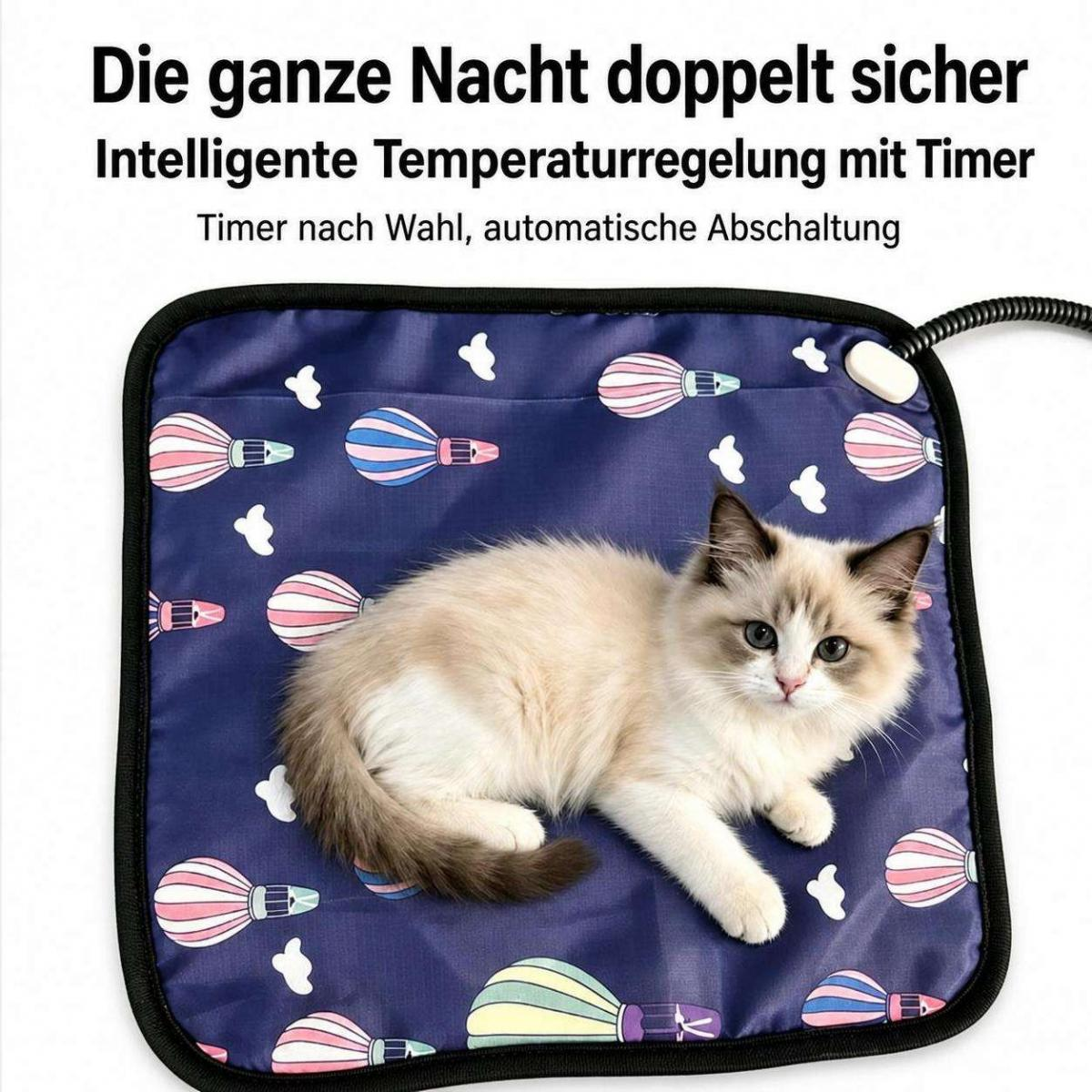 Eine Katze liegt auf einer blauen Heizmatte mit Heißluftballon-Muster, begleitet von deutschem Werbetext.