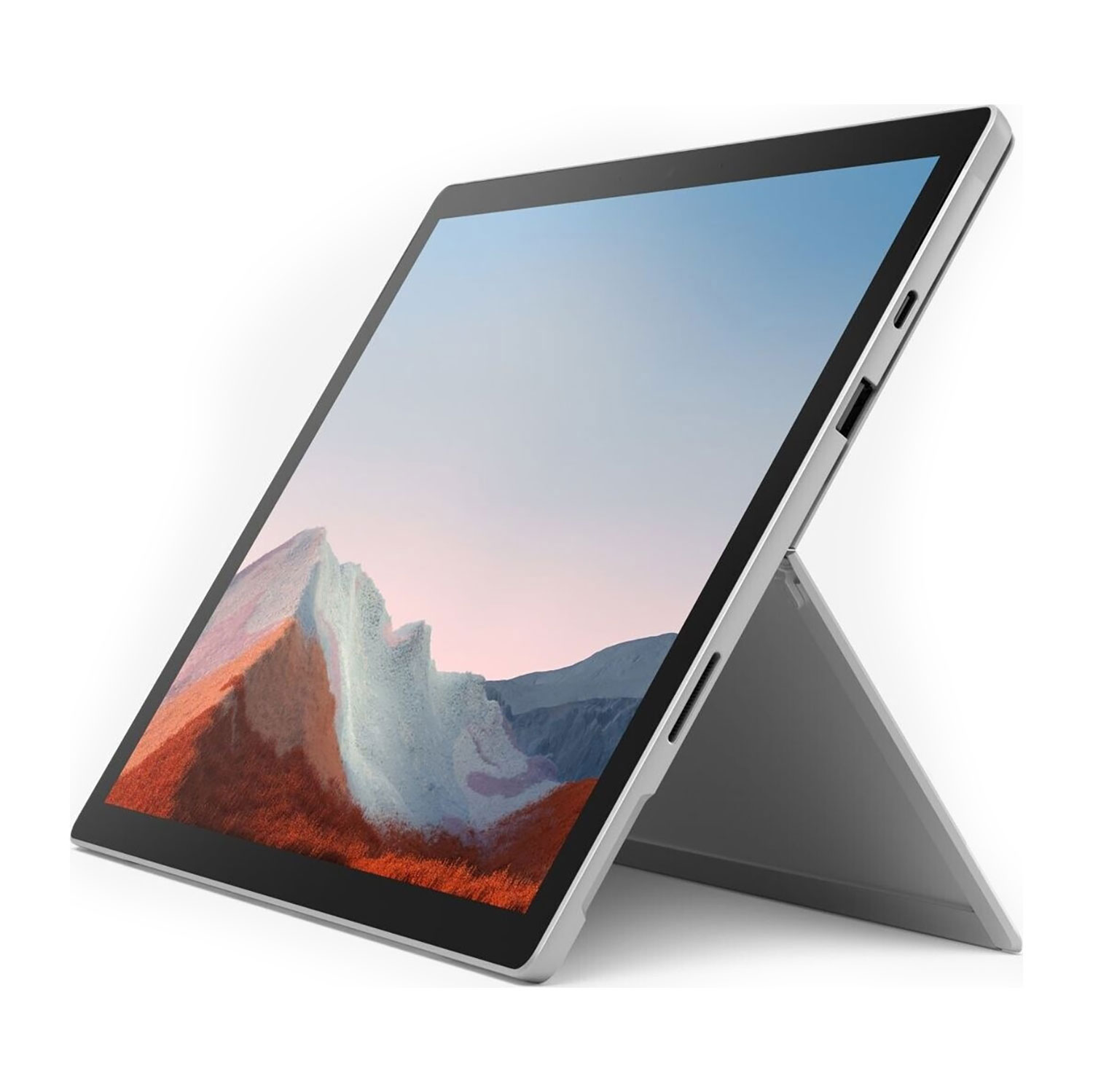 Ein silbernes Tablet mit ausgeklapptem Ständer zeigt auf dem Bildschirm eine farbenfrohe Berglandschaft.