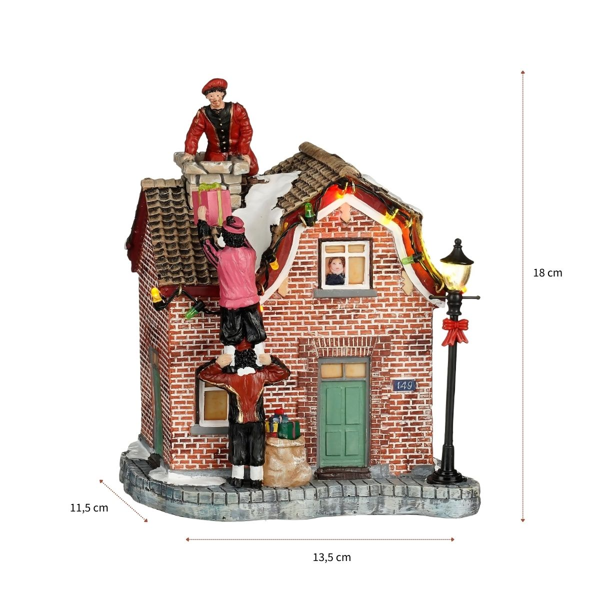 Weihnachtsdorf-Miniatur mit rotem Ziegelhaus, Figuren, Lichtern und Maßen von 13,5x11,5x18 cm.