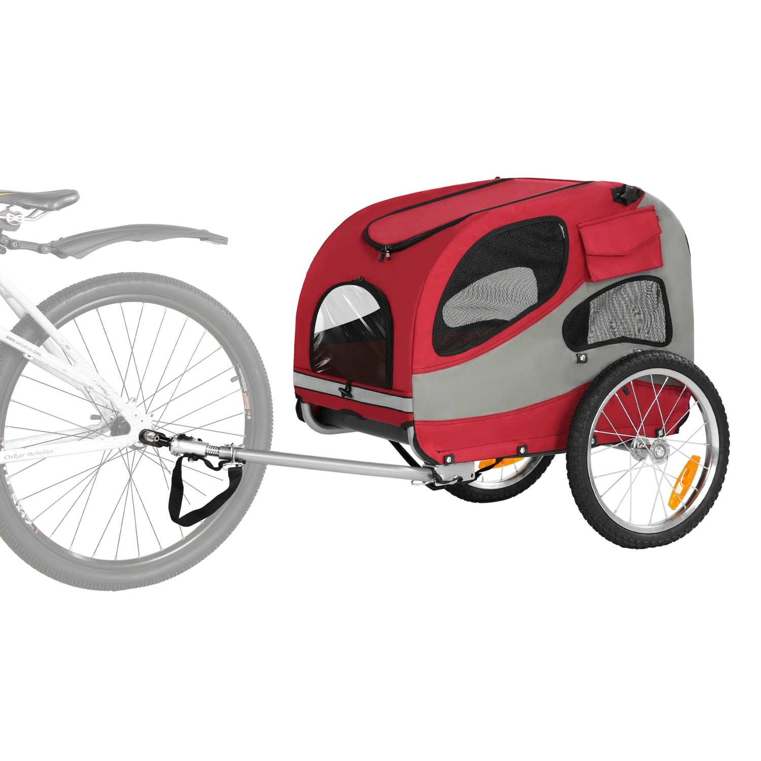 Remolque rojo y gris para mascotas acoplado a una bicicleta blanca sobre fondo blanco.