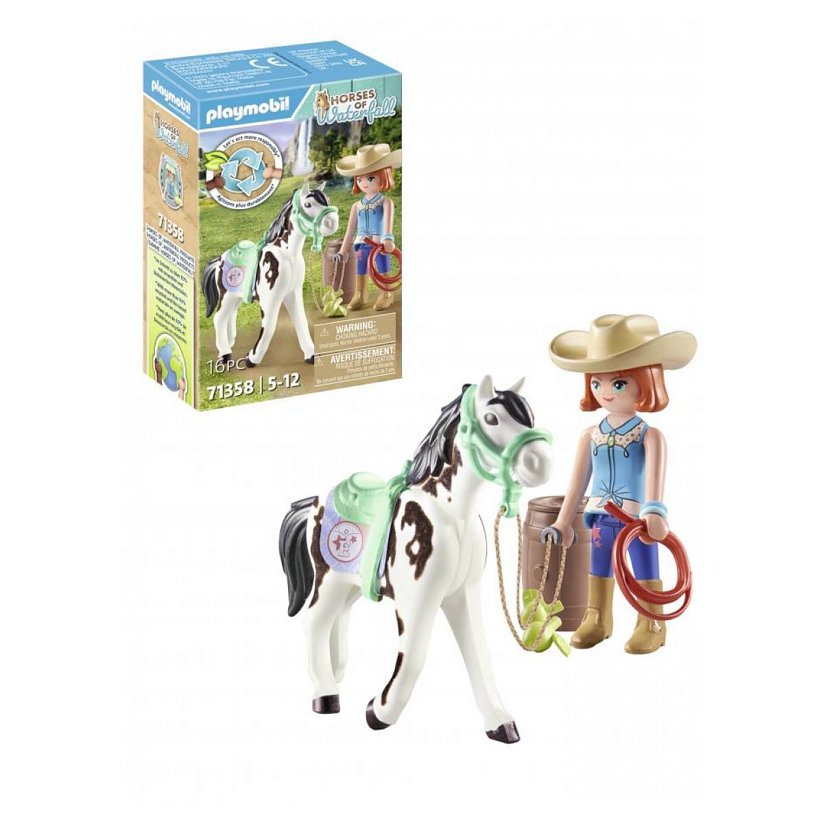 Zestaw Playmobil z kowbojką, łaciatym koniem, lassem i akcesoriami obok pudełka.