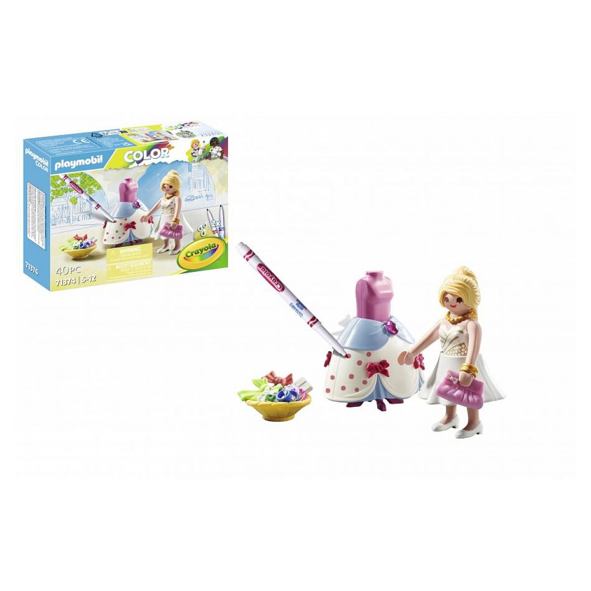 Set Playmobil Color con muñeca, vestido, rotulador y caja sobre fondo blanco.