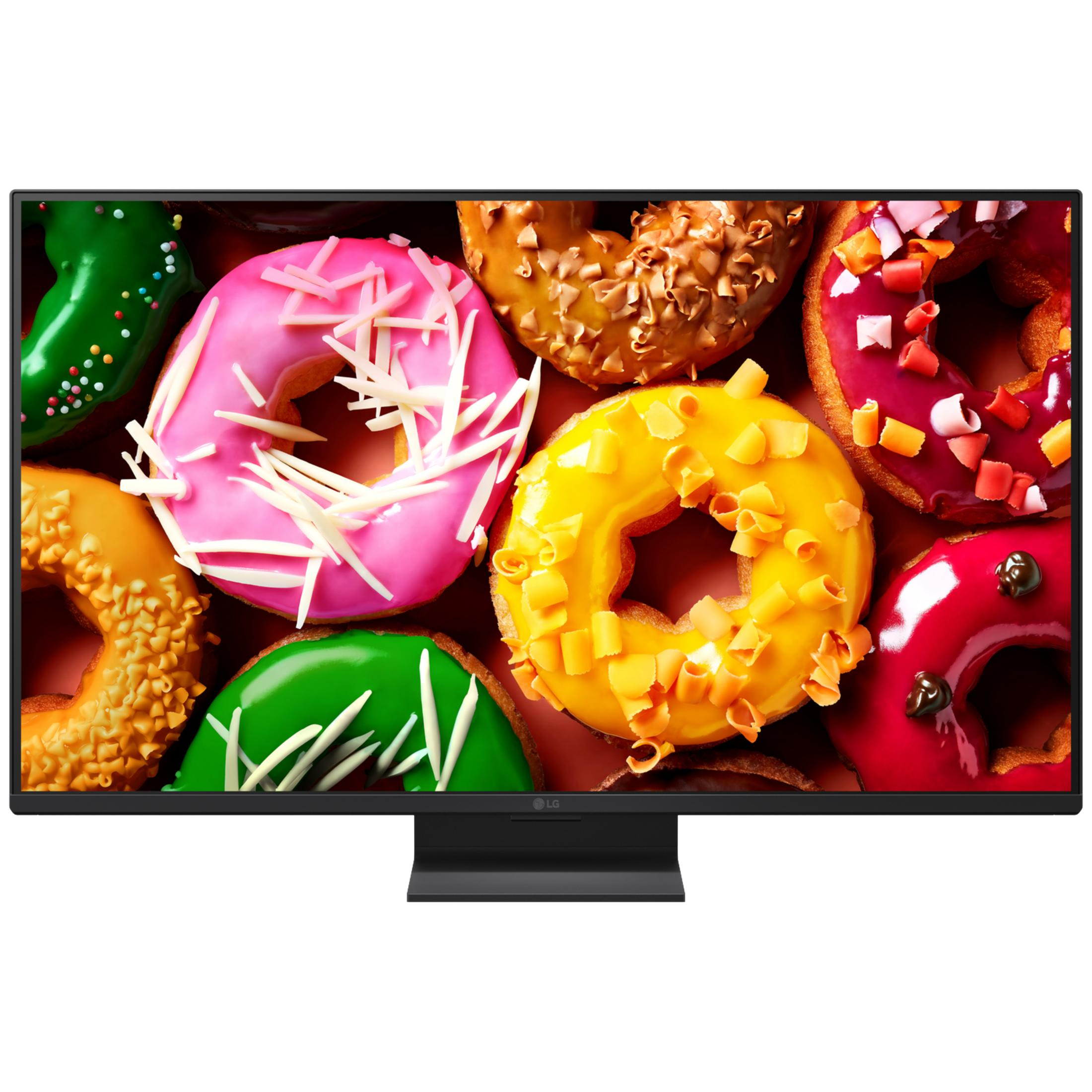 Un monitor LG mostra un'immagine vivace di vari donut glassati con decorazioni.