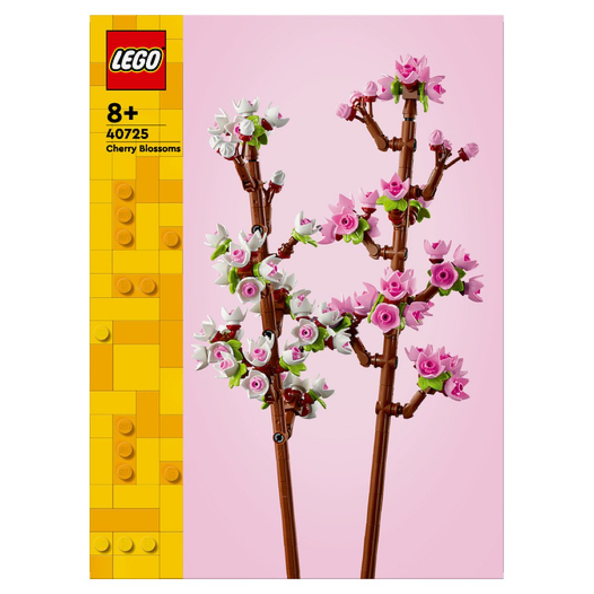 Lego Kiraz Çiçekleri kutusu pembe arka planda pembe ve beyaz çiçekli kahverengi dalları gösteriyor.