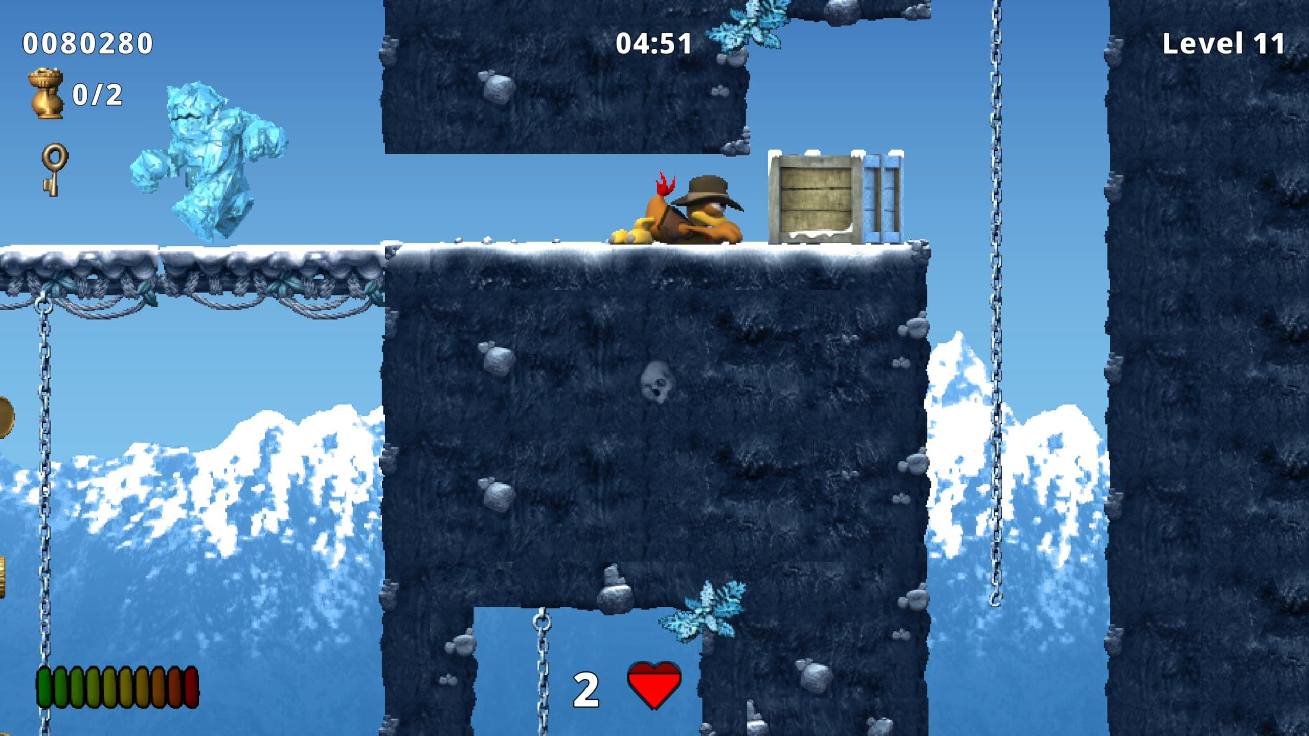 Ein Videospiel-Level zeigt eine Eiskreatur und einen Charakter in einer verschneiten Berglandschaft.