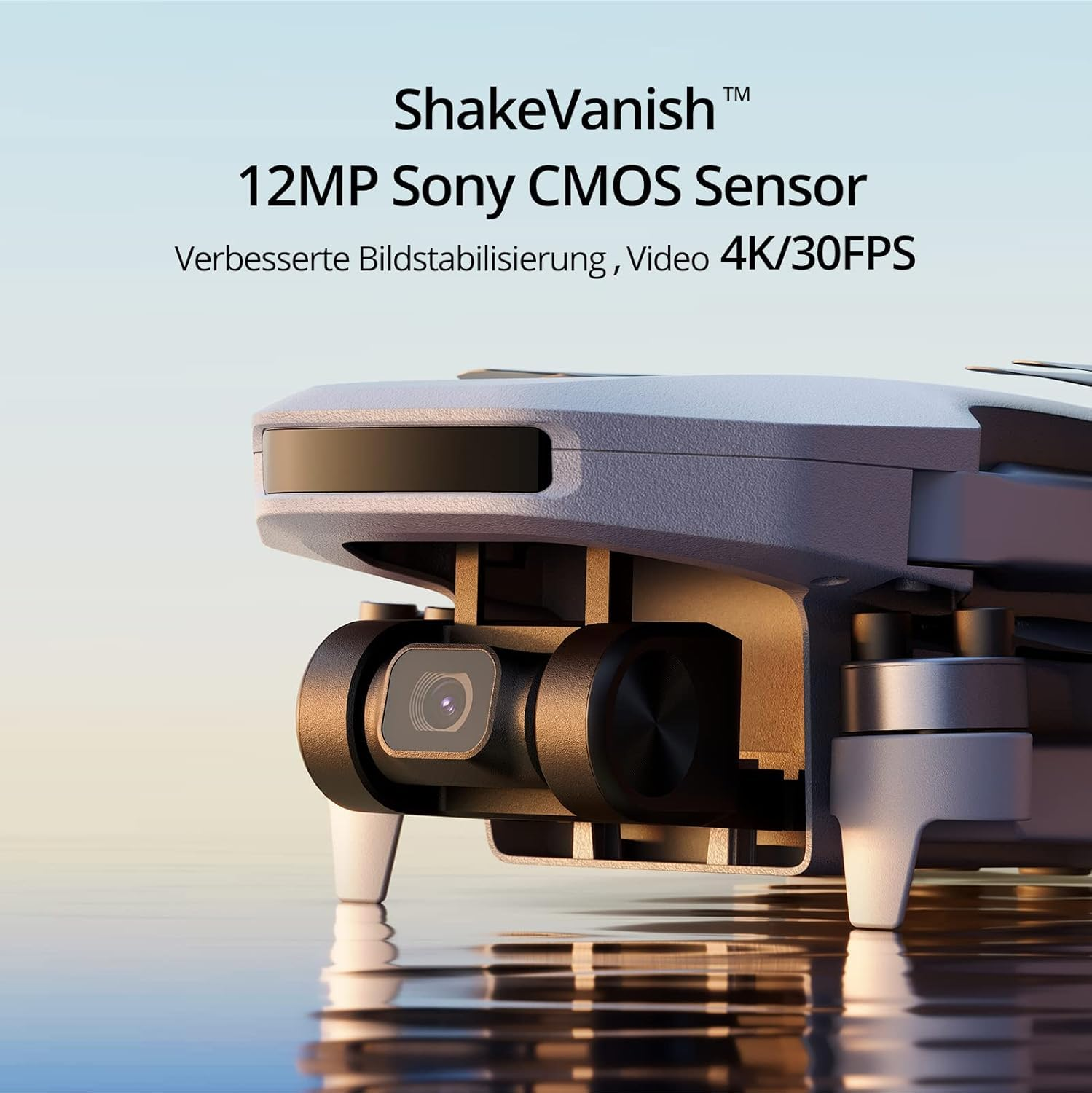 Drone grigio con fotocamera e testo su ShakeVanish, sensore da 12MP e video 4K su sfondo chiaro.