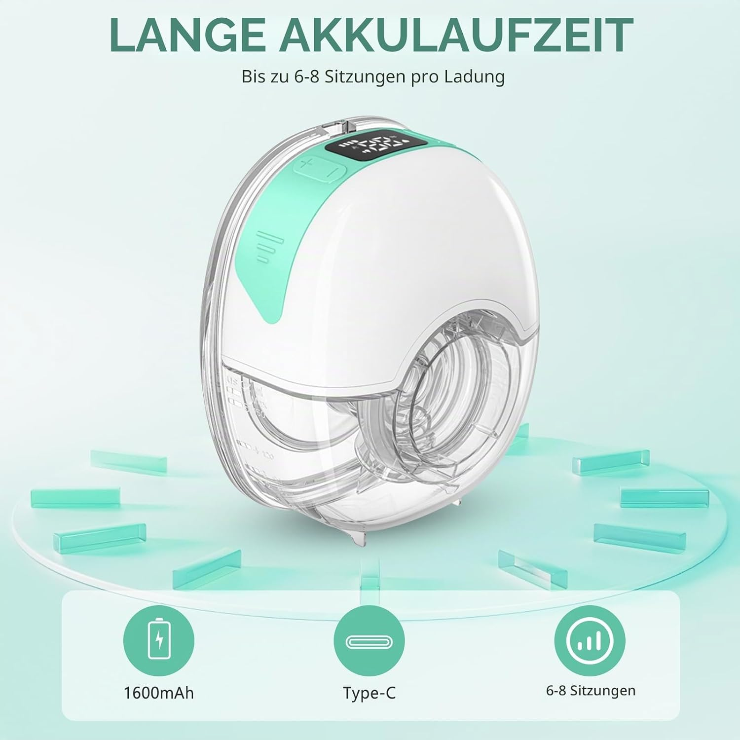 Eine weiße und türkise elektrische Milchpumpe mit Zifferblatt vor hellem Hintergrund.