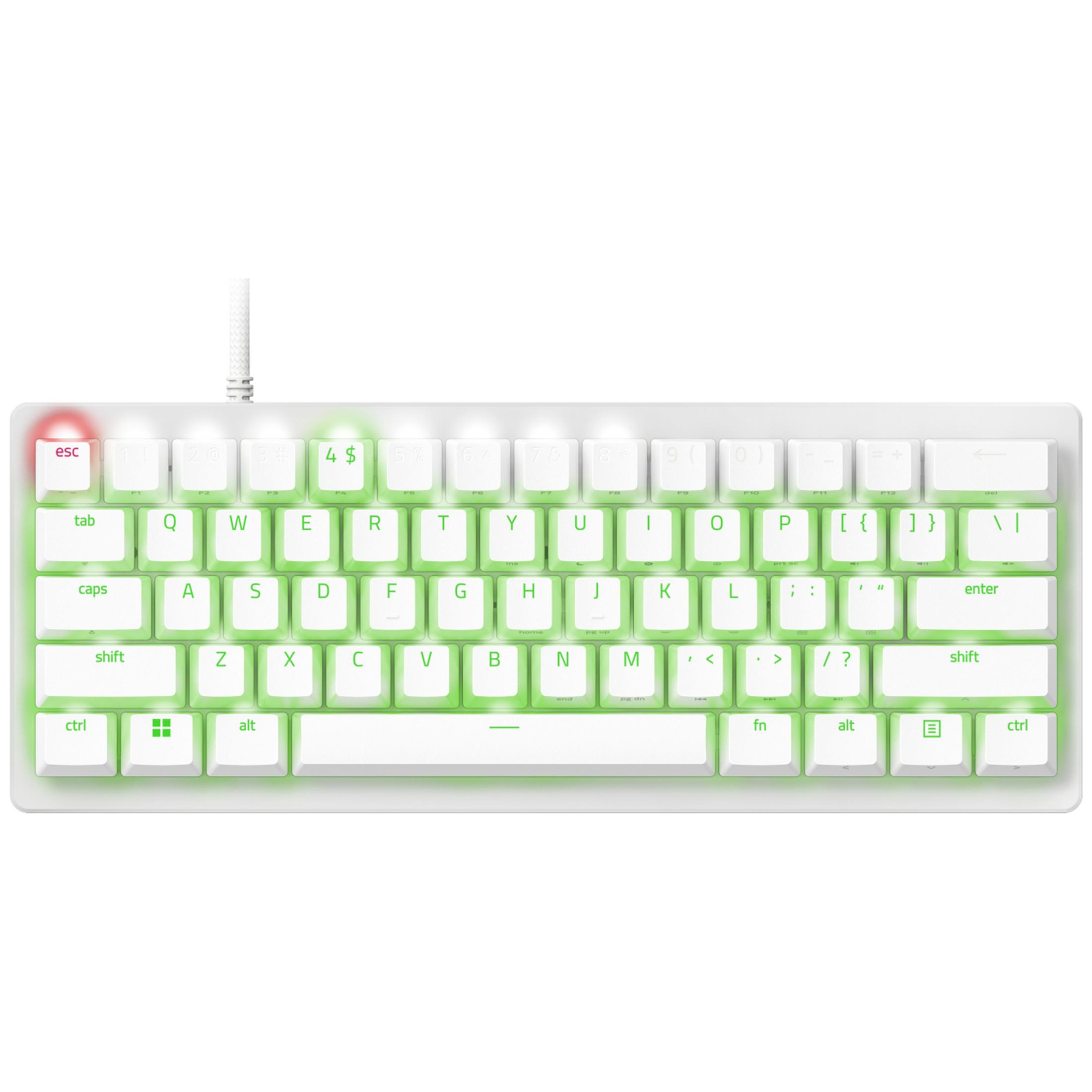 Una tastiera meccanica compatta bianca con retroilluminazione LED verde e tasto escape rosso.