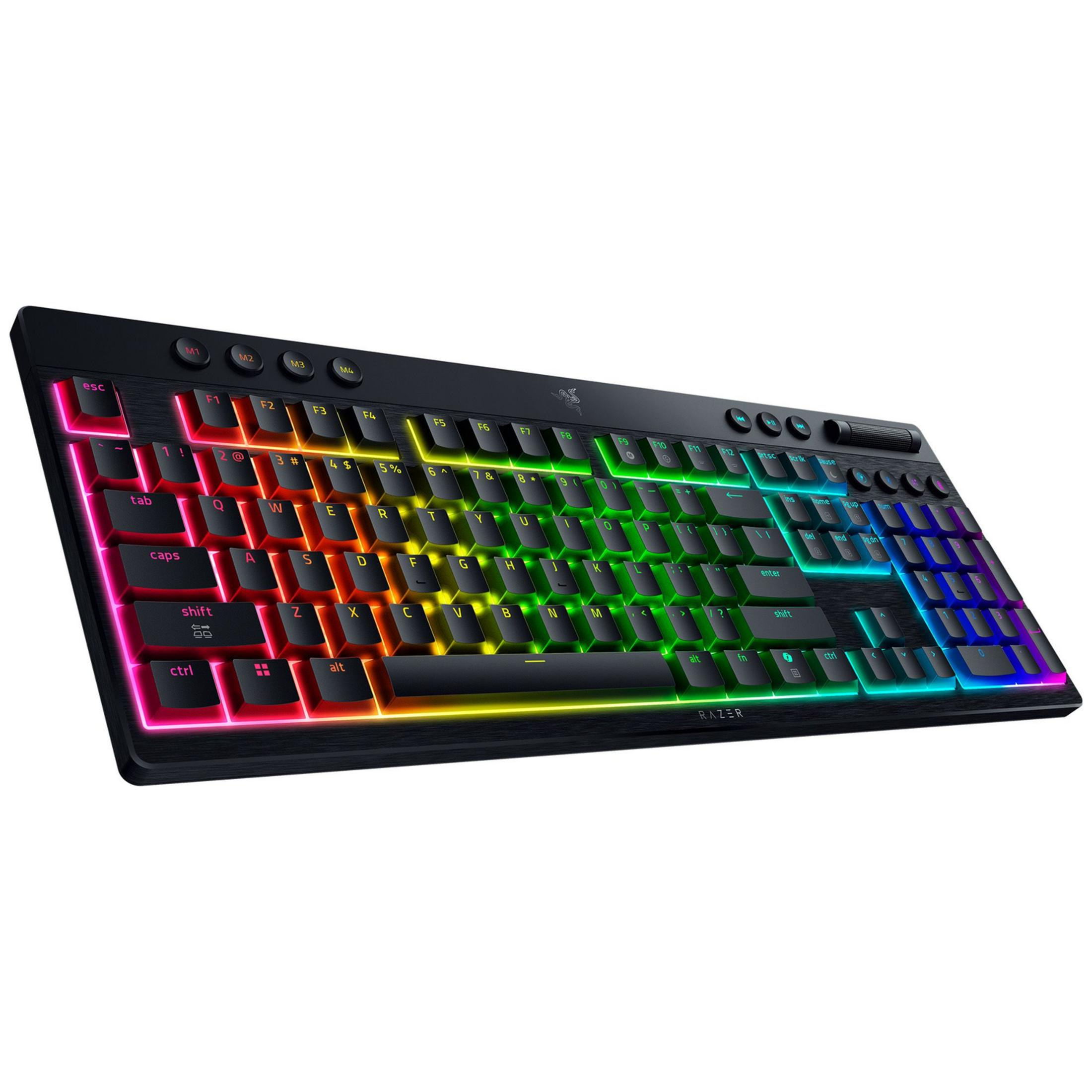 Una tastiera da gioco nera con retroilluminazione RGB personalizzabile brilla con uno spettro arcobaleno vibrante.