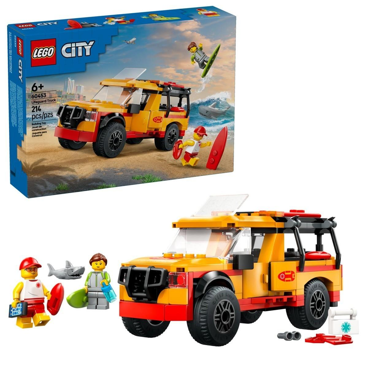 Lego City Rettungswagen-Set mit Auto, zwei Minifiguren, einem Hai und Zubehör.