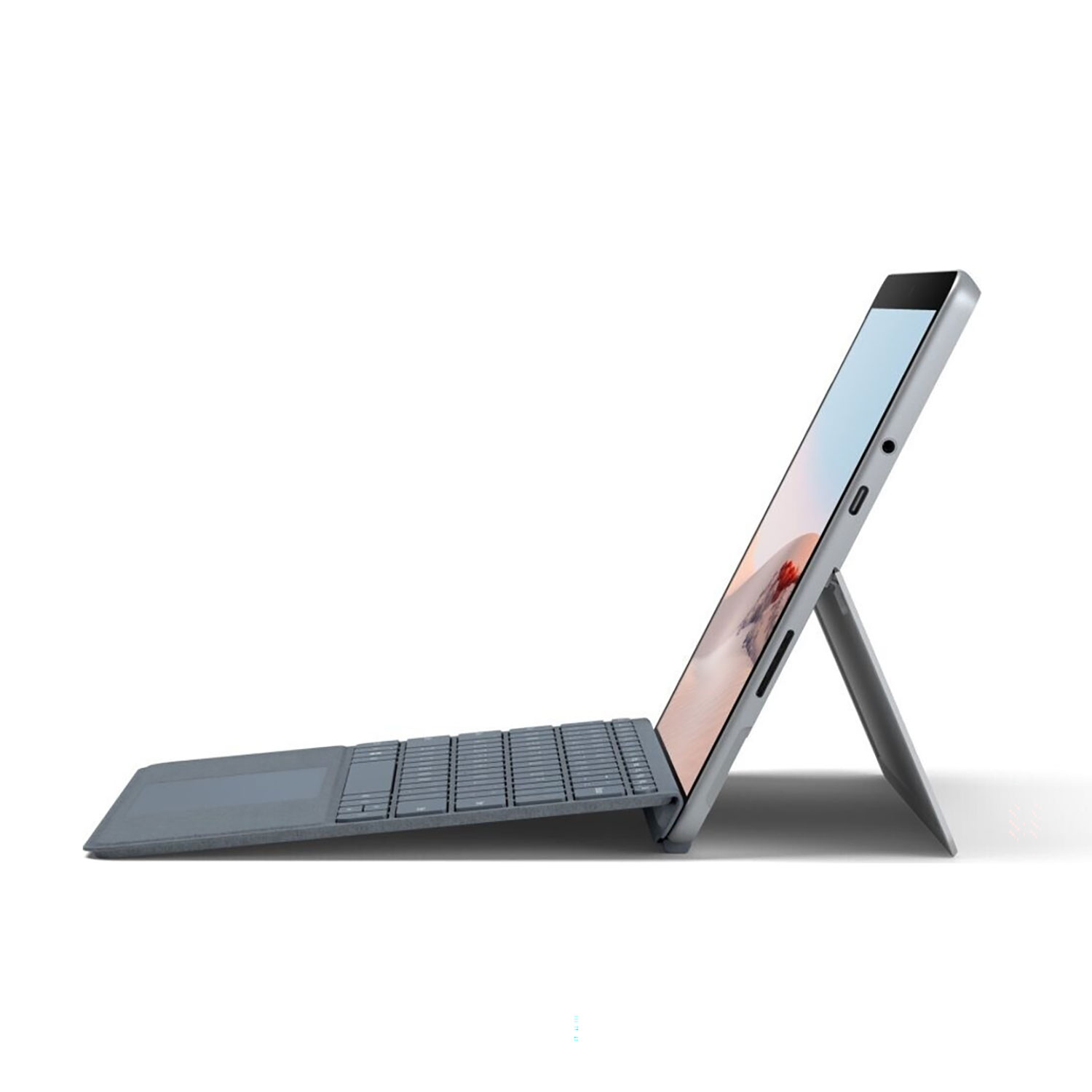 Seitenansicht eines grauen Tablets mit angeschlossener Tastatur und Ständer vor weißem Hintergrund.