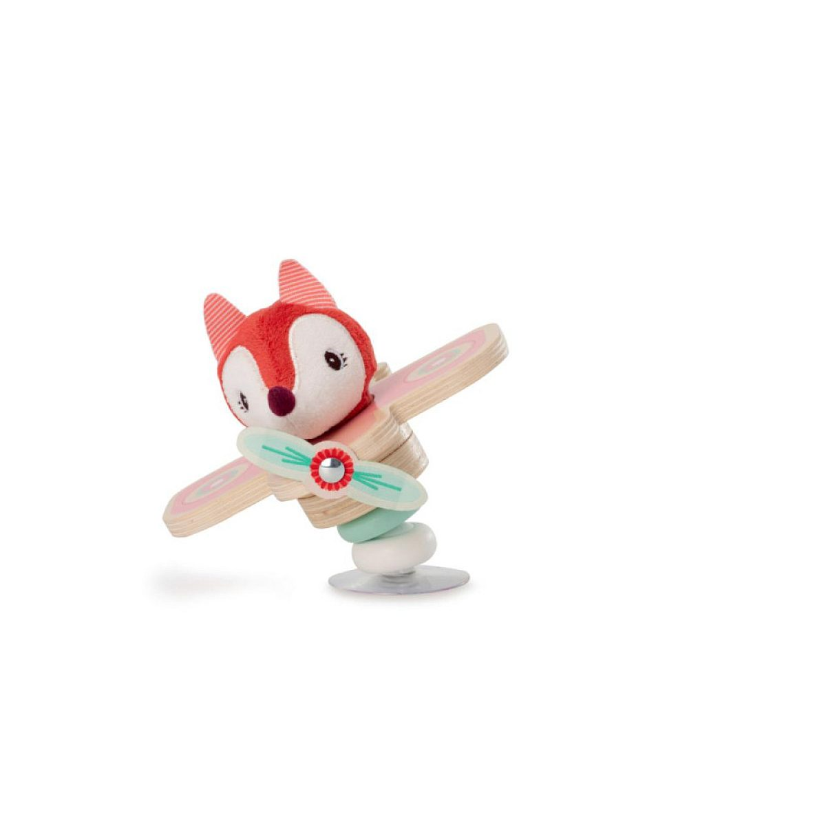 Ein Plüsch-Fuchs auf einem Holzflugzeugspielzeug mit Saugnapf auf weißem Grund.