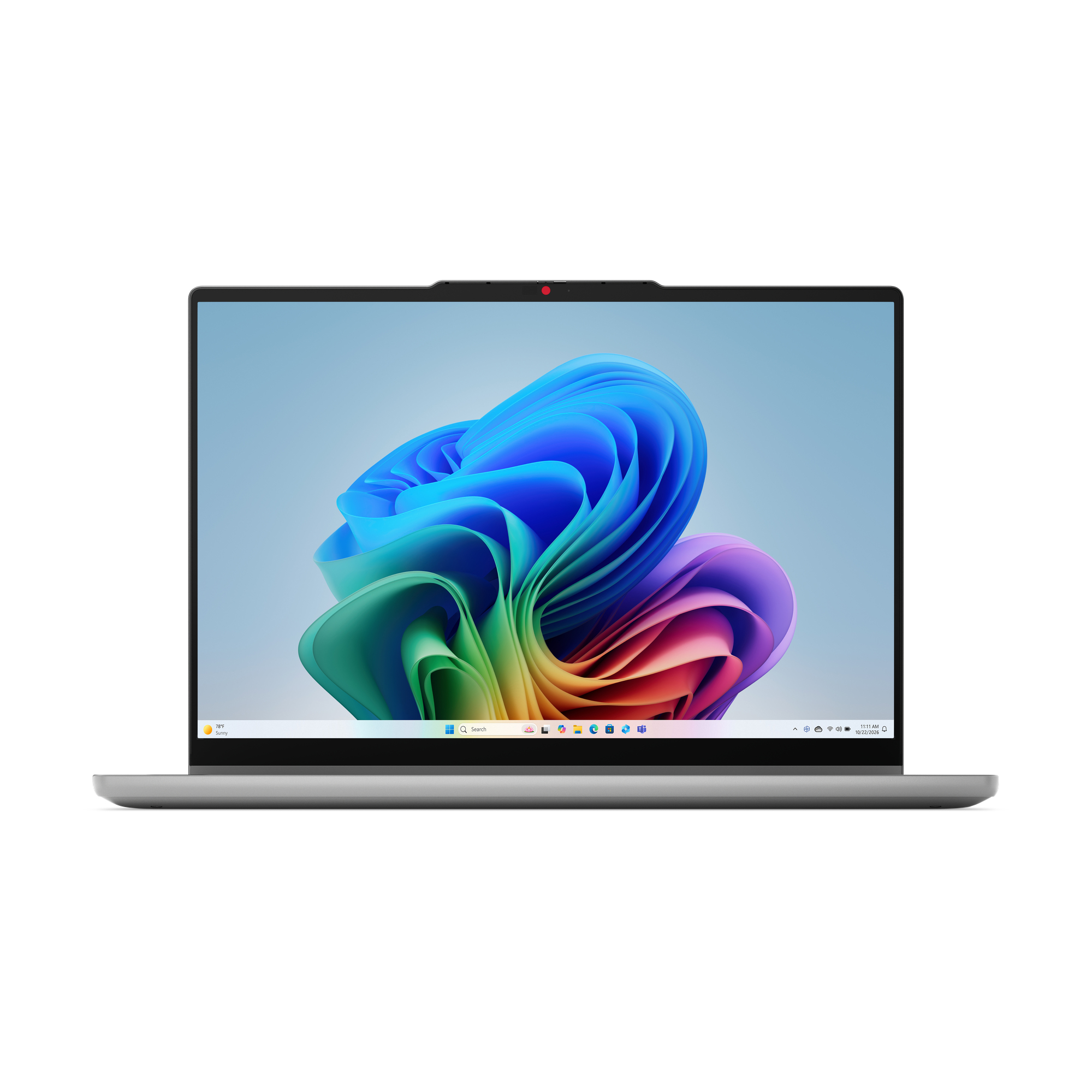 Srebrny laptop z kolorowym, abstrakcyjnym tłem i paskiem zadań systemu Windows na ekranie.