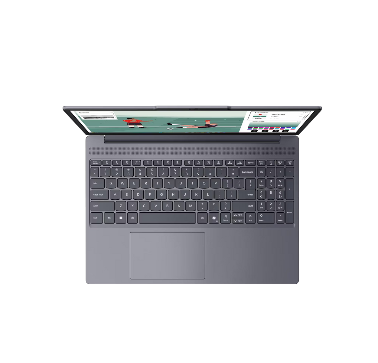 Un ordenador portátil gris abierto sobre fondo negro muestra su teclado QWERTY y una ilustración de fútbol en la pantalla.