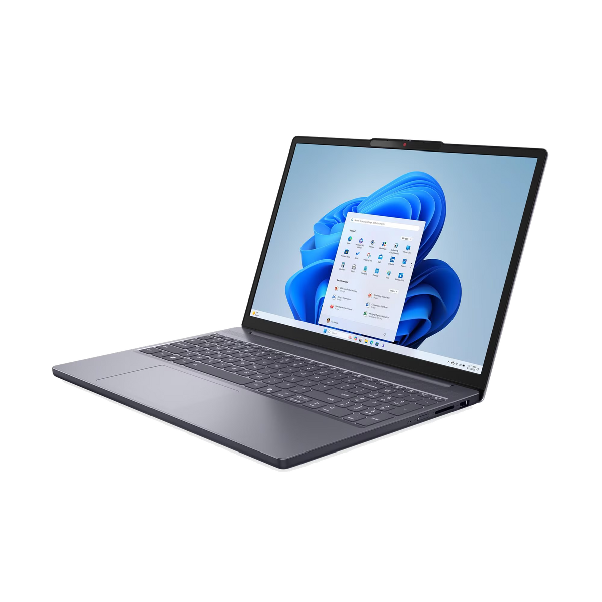 Un portátil gris sobre fondo negro muestra el escritorio de Windows 11 con fondo de onda azul.