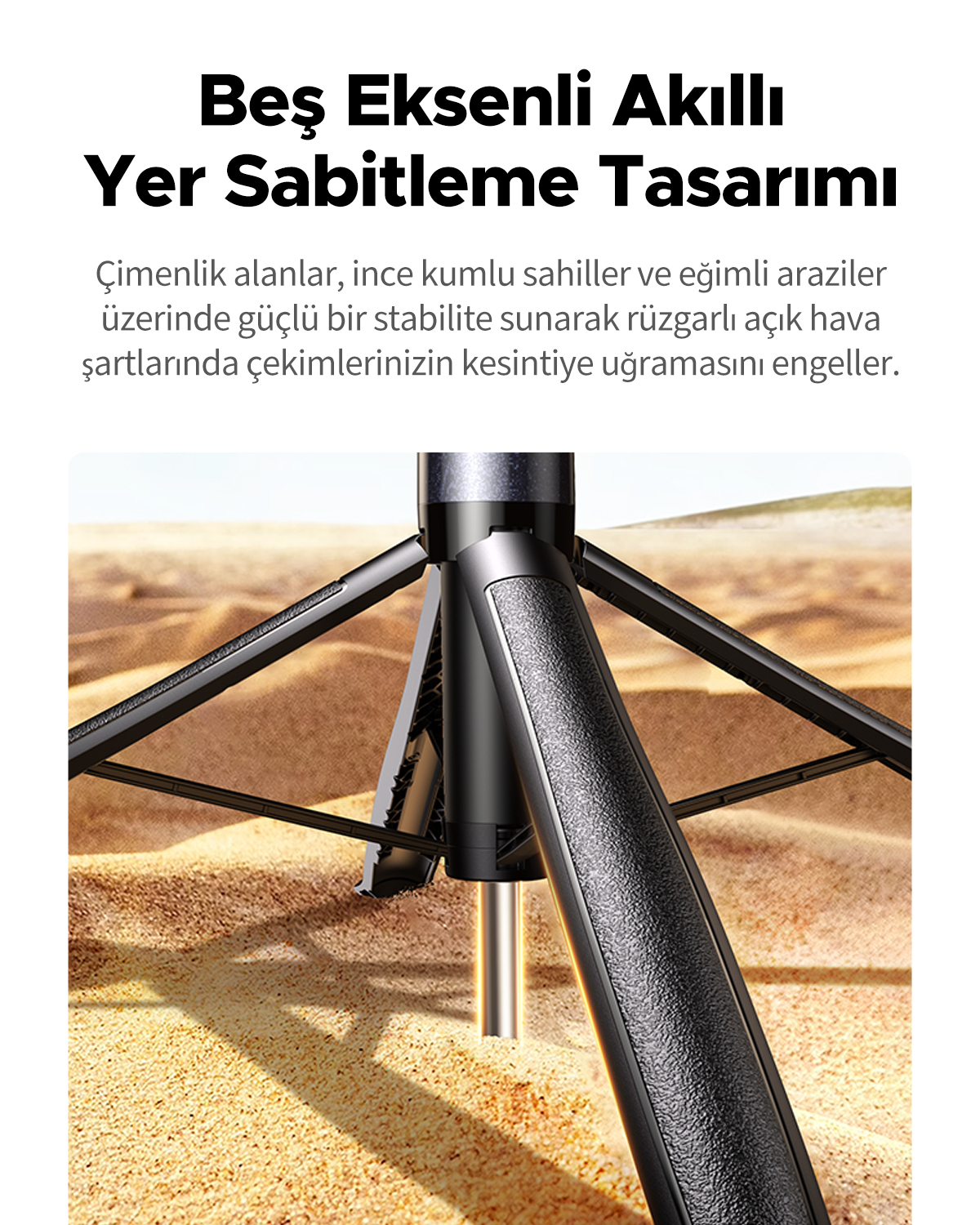 Kumlu zemin üzerinde tripot ayakları, üstte metin ile.