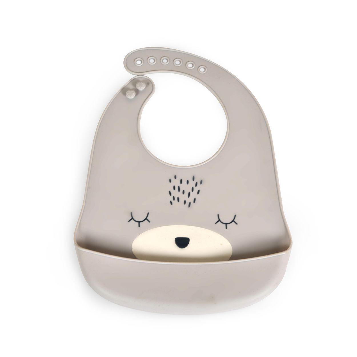 Ein beiger Silikon-Babylatz mit Bärenmotiv und Auffangschale vor weißem Hintergrund.