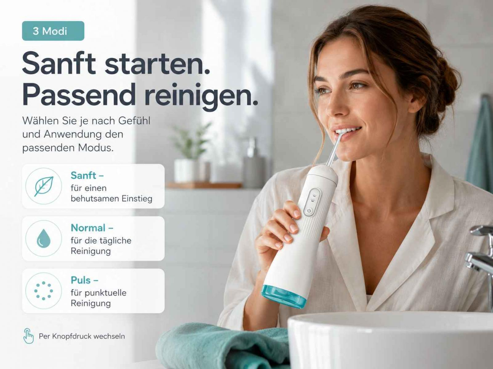 Eine Frau benutzt im Badezimmer eine weiße Munddusche vor einem Waschbecken.