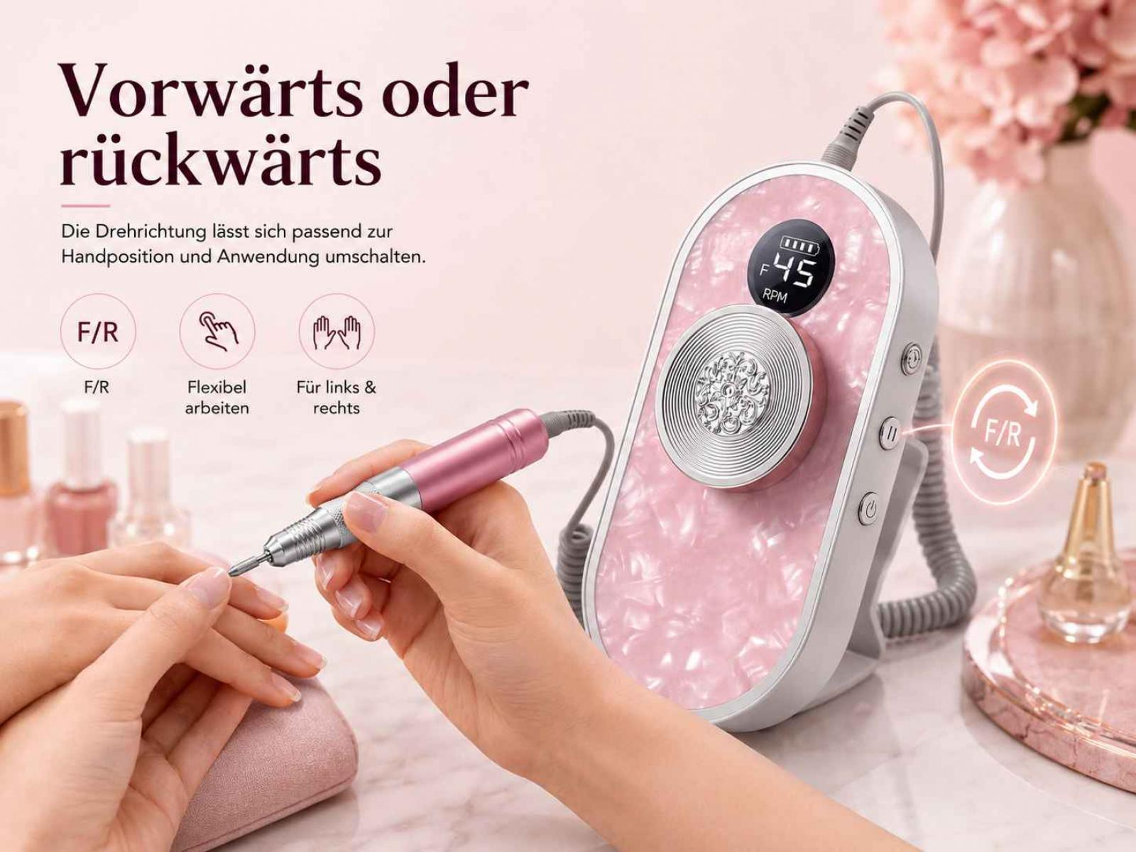 Eine Person benutzt eine rosa elektrische Nagelfeile an einer Hand, neben einer Steuereinheit.
