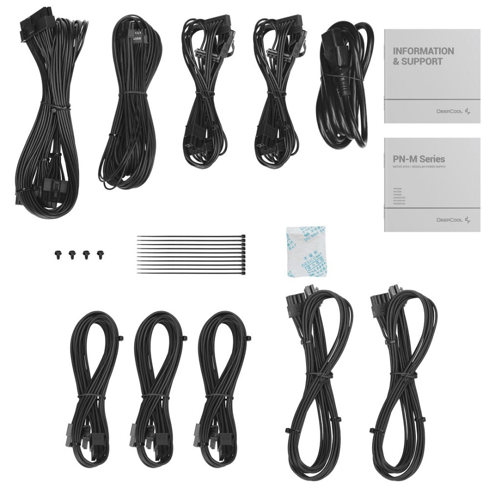 Cables de alimentación negros, tornillos, bridas, manuales y un paquete desecante sobre fondo blanco.