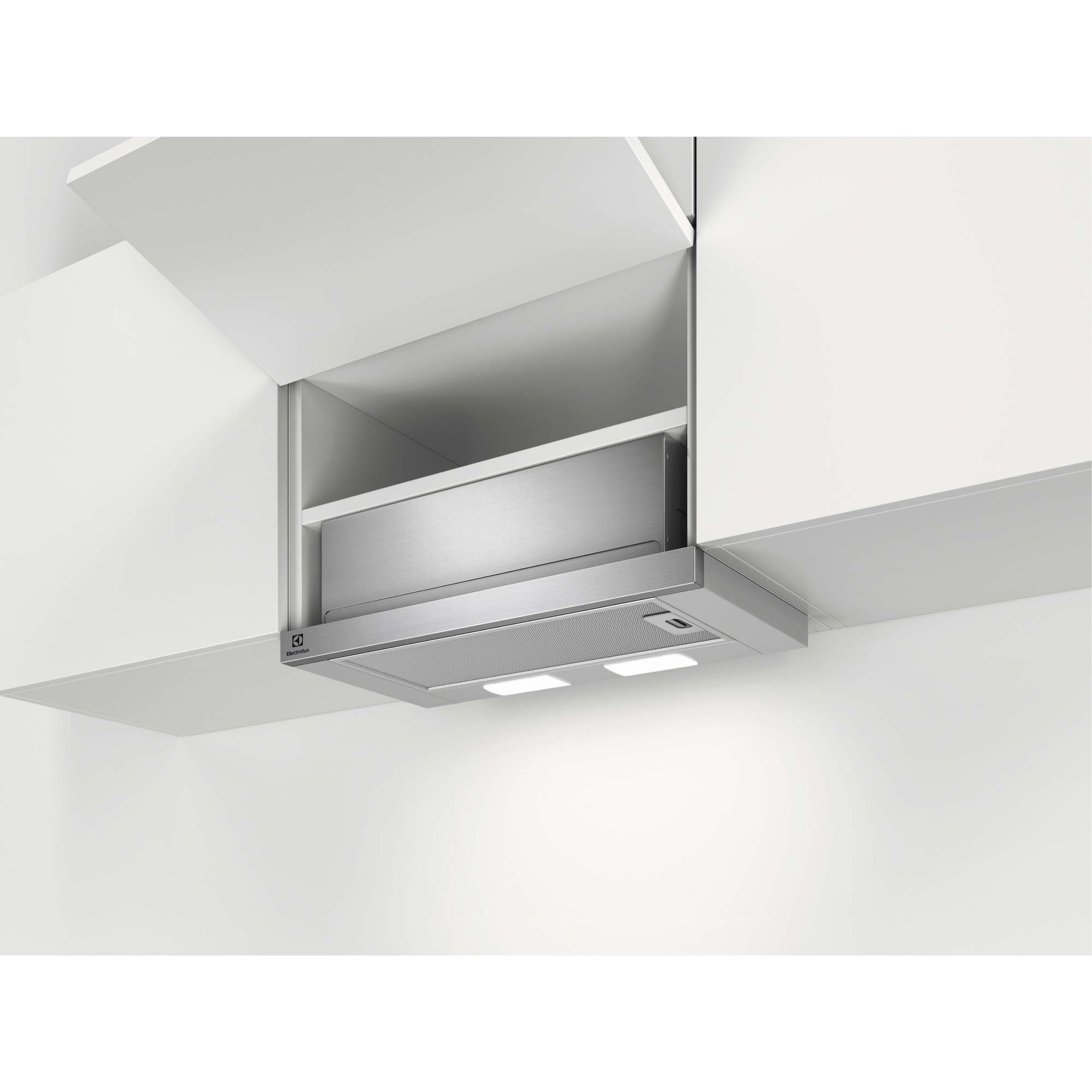 Una campana extractora de acero inoxidable empotrada en muebles blancos.