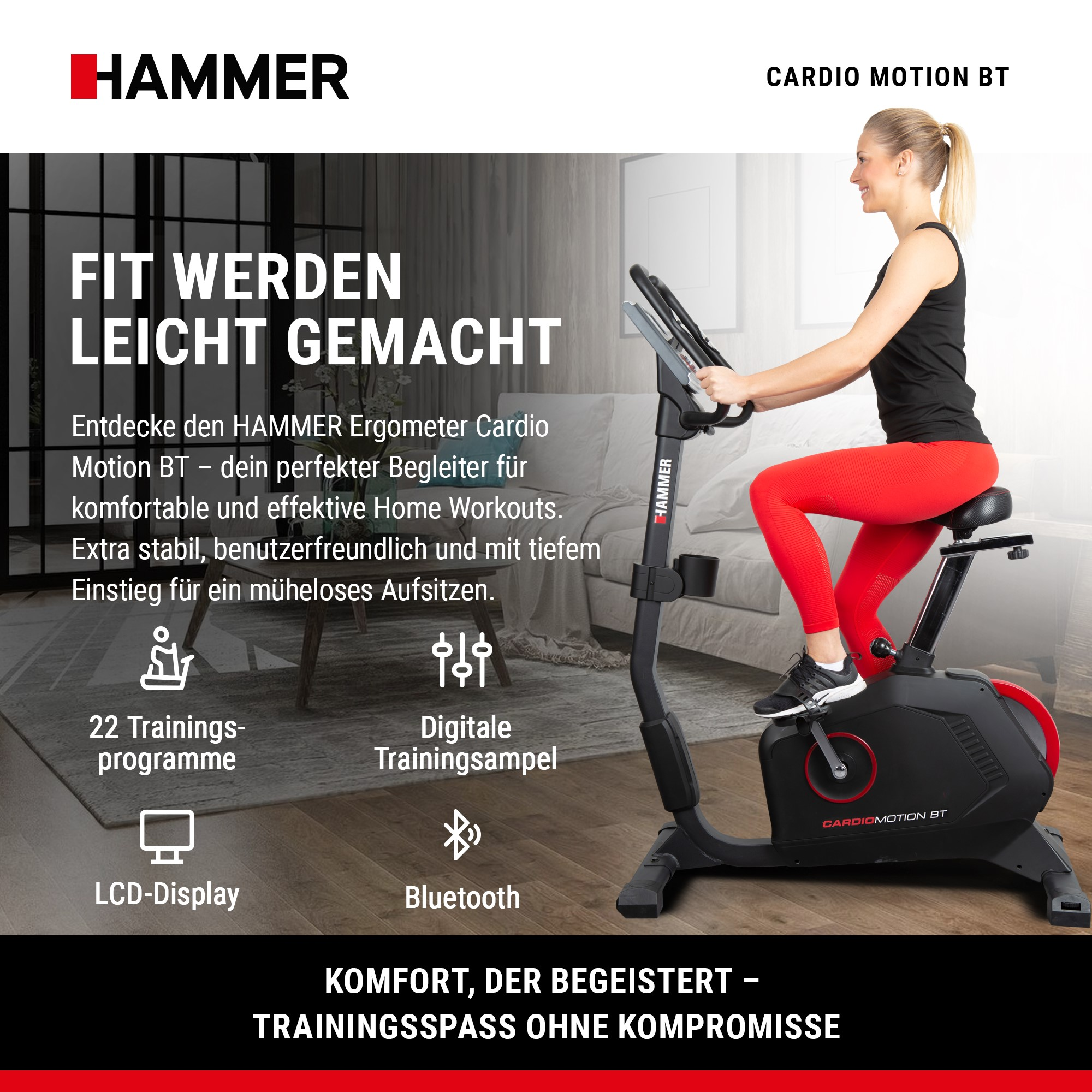 Eine lächelnde Frau in roten Leggings fährt in einem modernen Wohnzimmer auf einem schwarzen Hammer Heimtrainer.