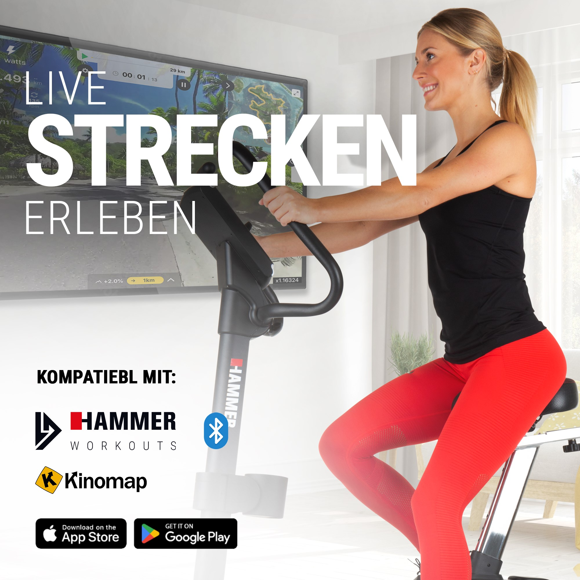 Eine blonde Frau in roten Leggings trainiert auf einem Fitnessbike mit Bildschirm im Hintergrund.