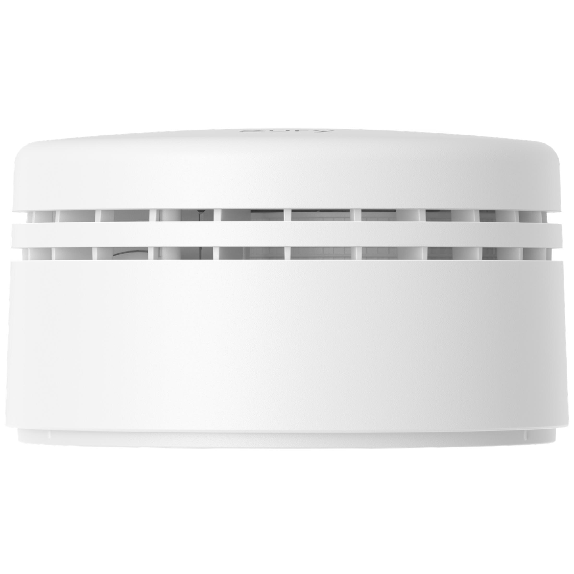 Un detector de humo redondo y blanco con ranuras de ventilación sobre un fondo blanco.