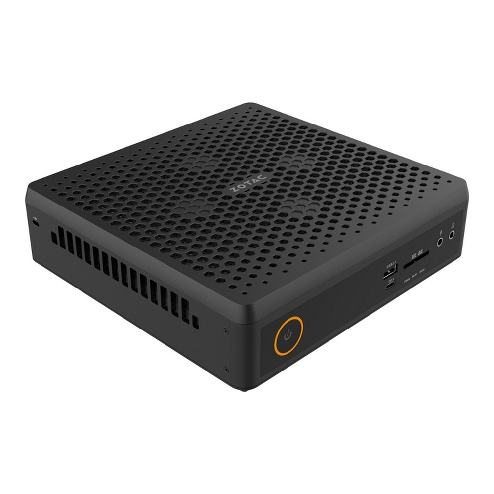 Mini PC Zotac nero con motivo a nido d'ape sulla custodia e pulsante di accensione arancione sul davanti.