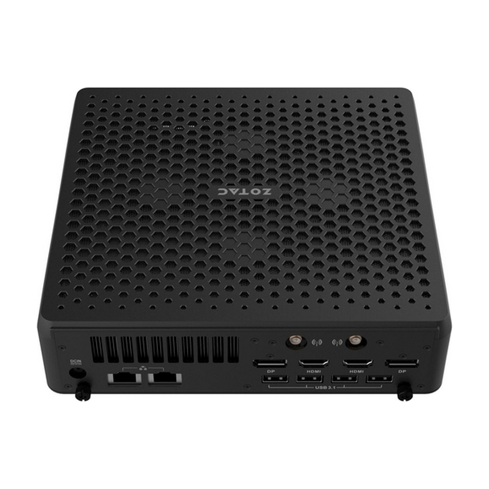 Mini PC Zotac nero visto dall'alto, con coperchio perforato e porte posteriori.