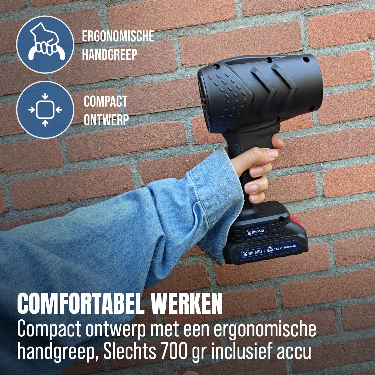 A hand in a blue denim shirt holding a black cordless tool against a brick wall, with text overlays.