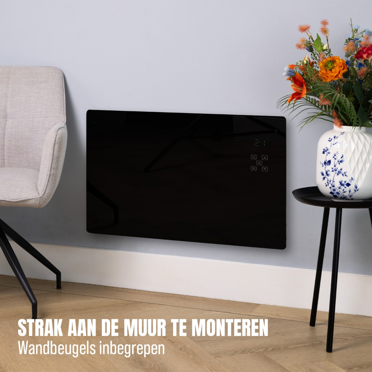 Black wall heater on a grey wall with a chair and flowers.