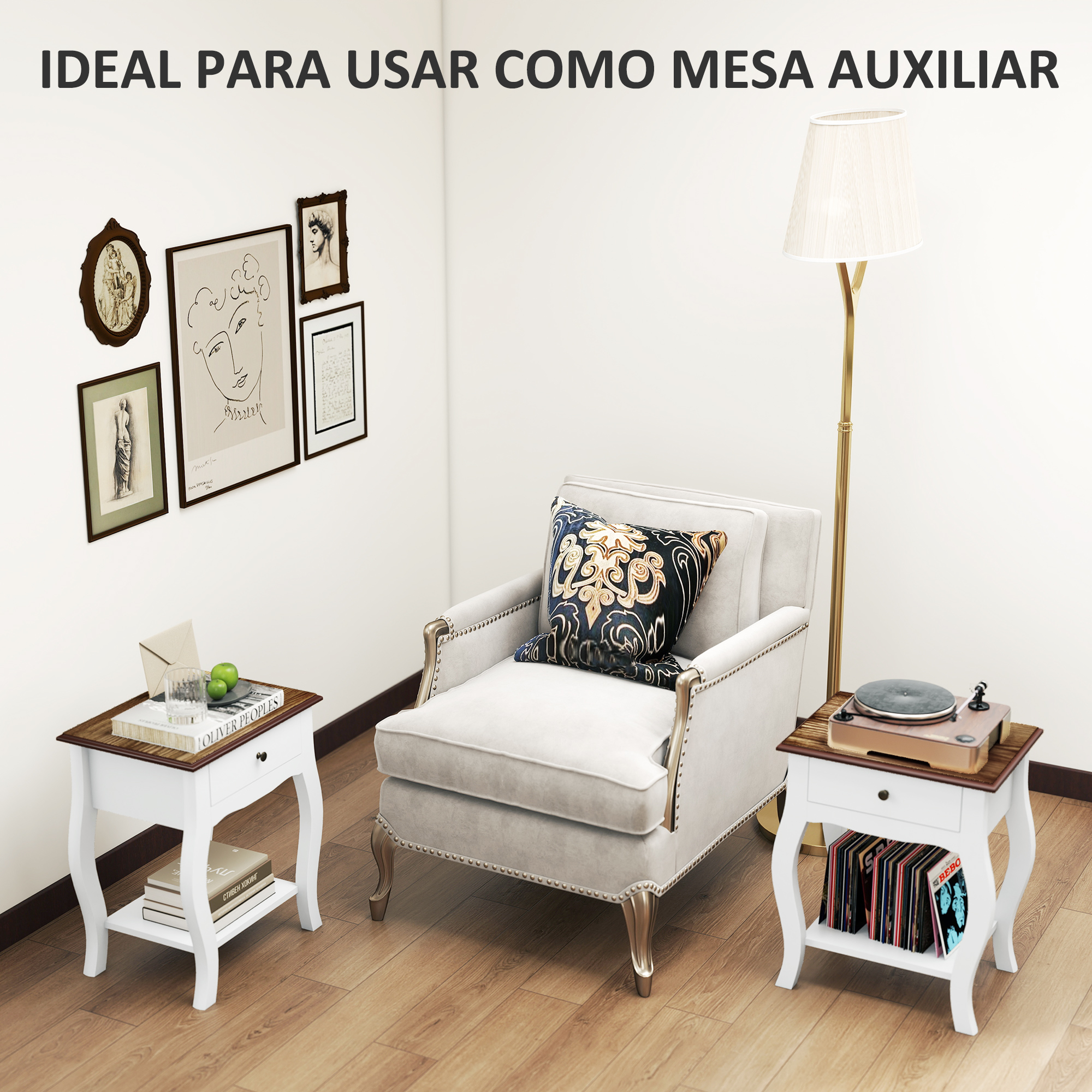 Sala de estar con sillón, mesa auxiliar blanca, lámpara de pie y cuadros.