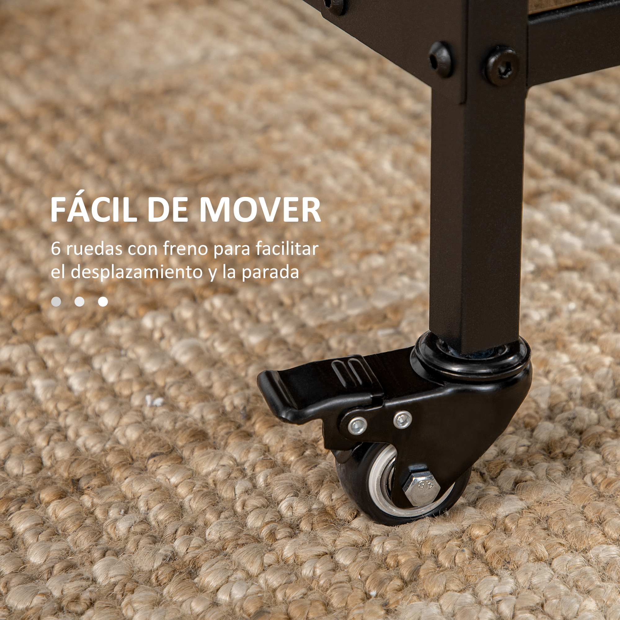 Pata de mueble negra con rueda giratoria y freno sobre alfombra de yute.