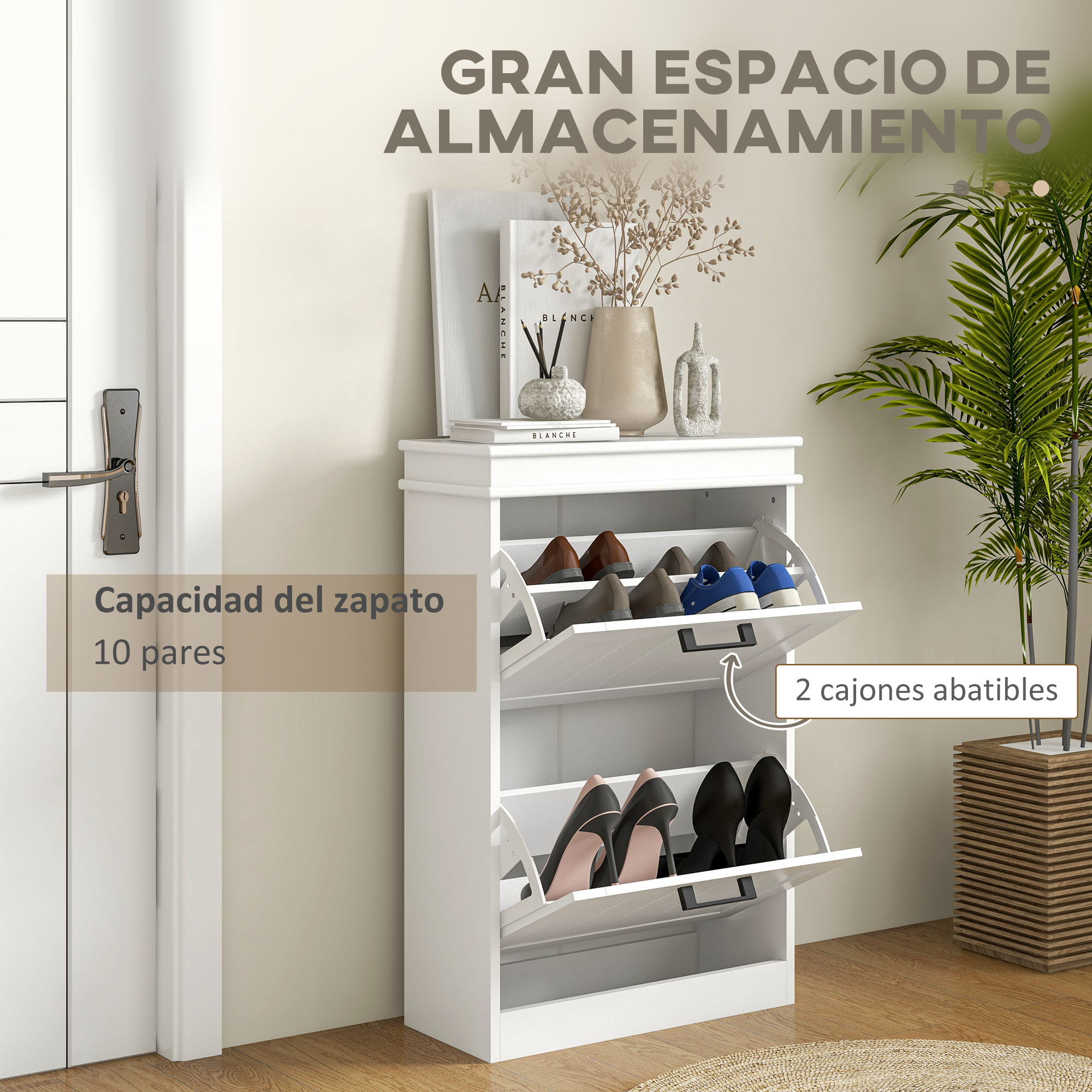 Zapatero blanco con dos cajones abatibles, decorado encima y junto a una planta.